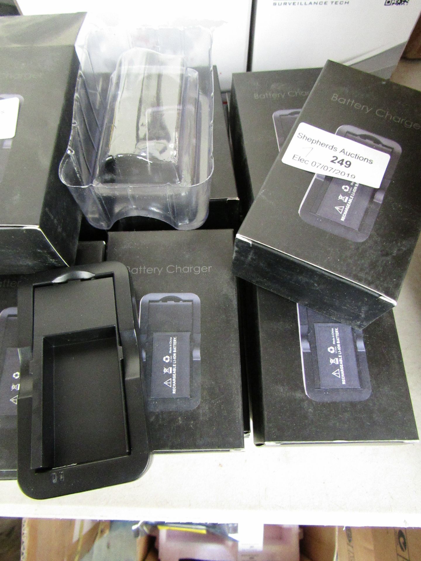 7x Battery Chargers, new and boxed