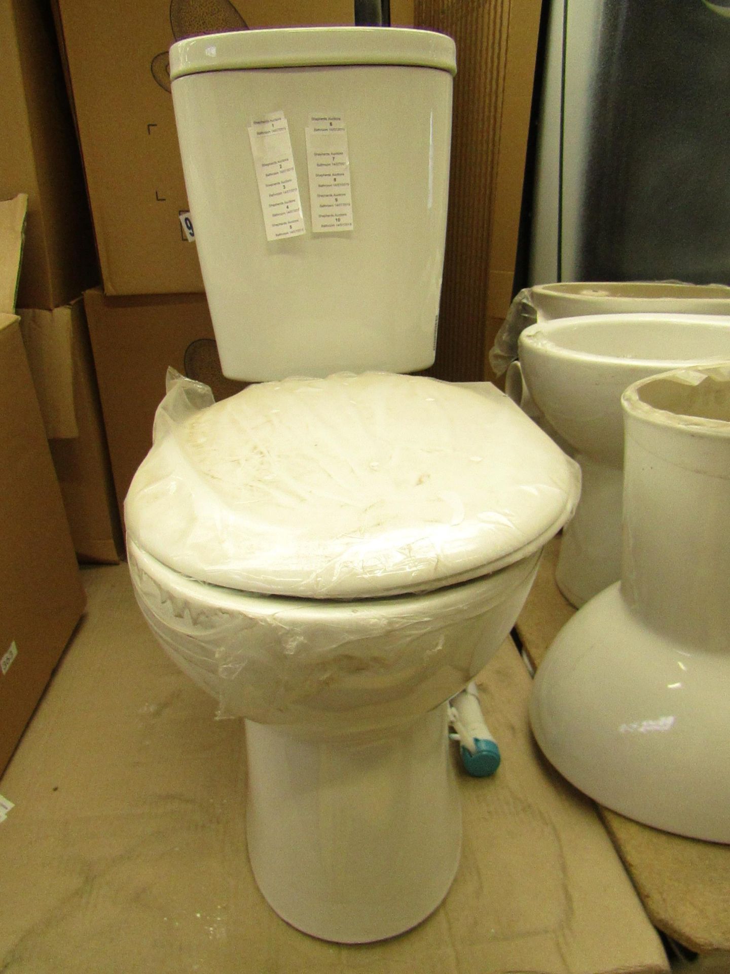 Unbranded Roca WC toilet pan and cistern with flush tank, all brand new.