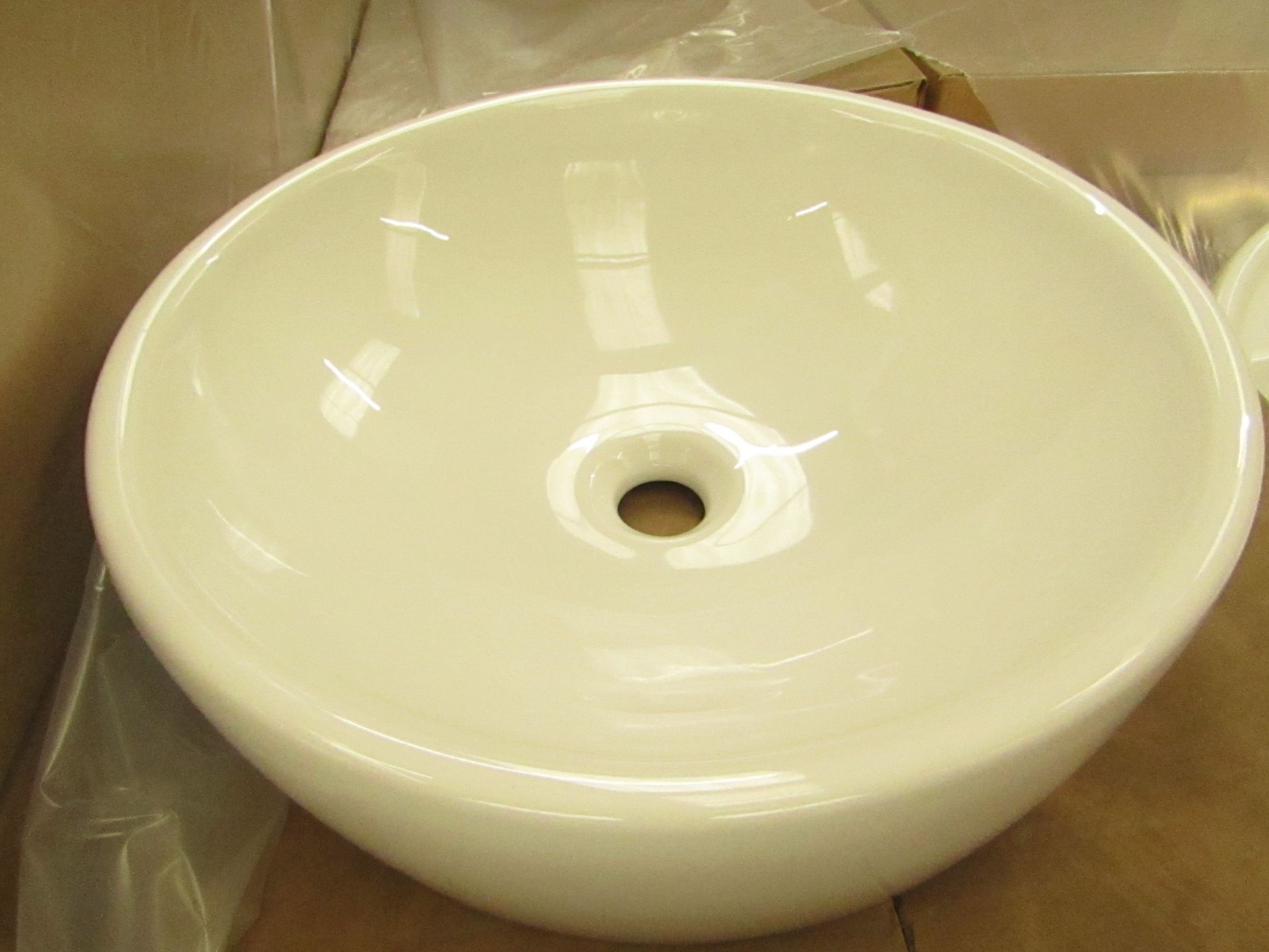 Nabis 450mm round counter top 0TH basin, new and boxed.