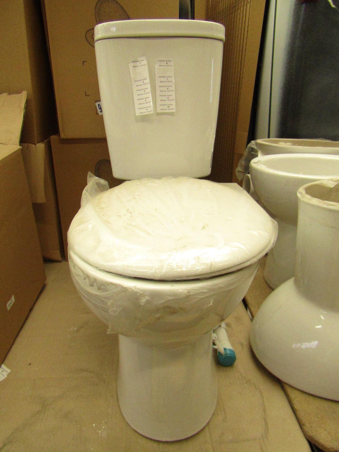 Unbranded Roca WC toilet pan and cistern with flush tank, all brand new.