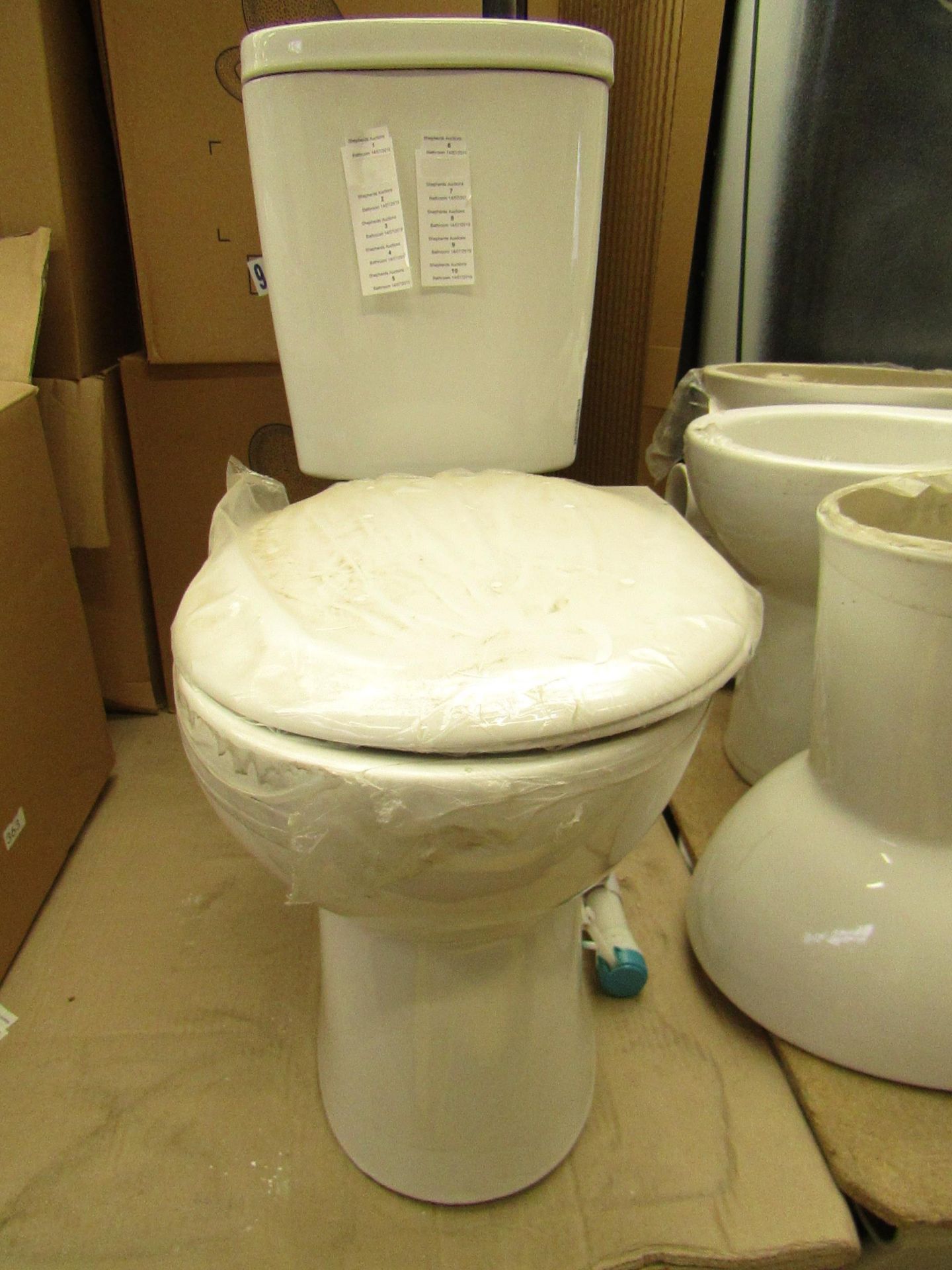 Unbranded Roca WC toilet pan and cistern with flush tank, all brand new.