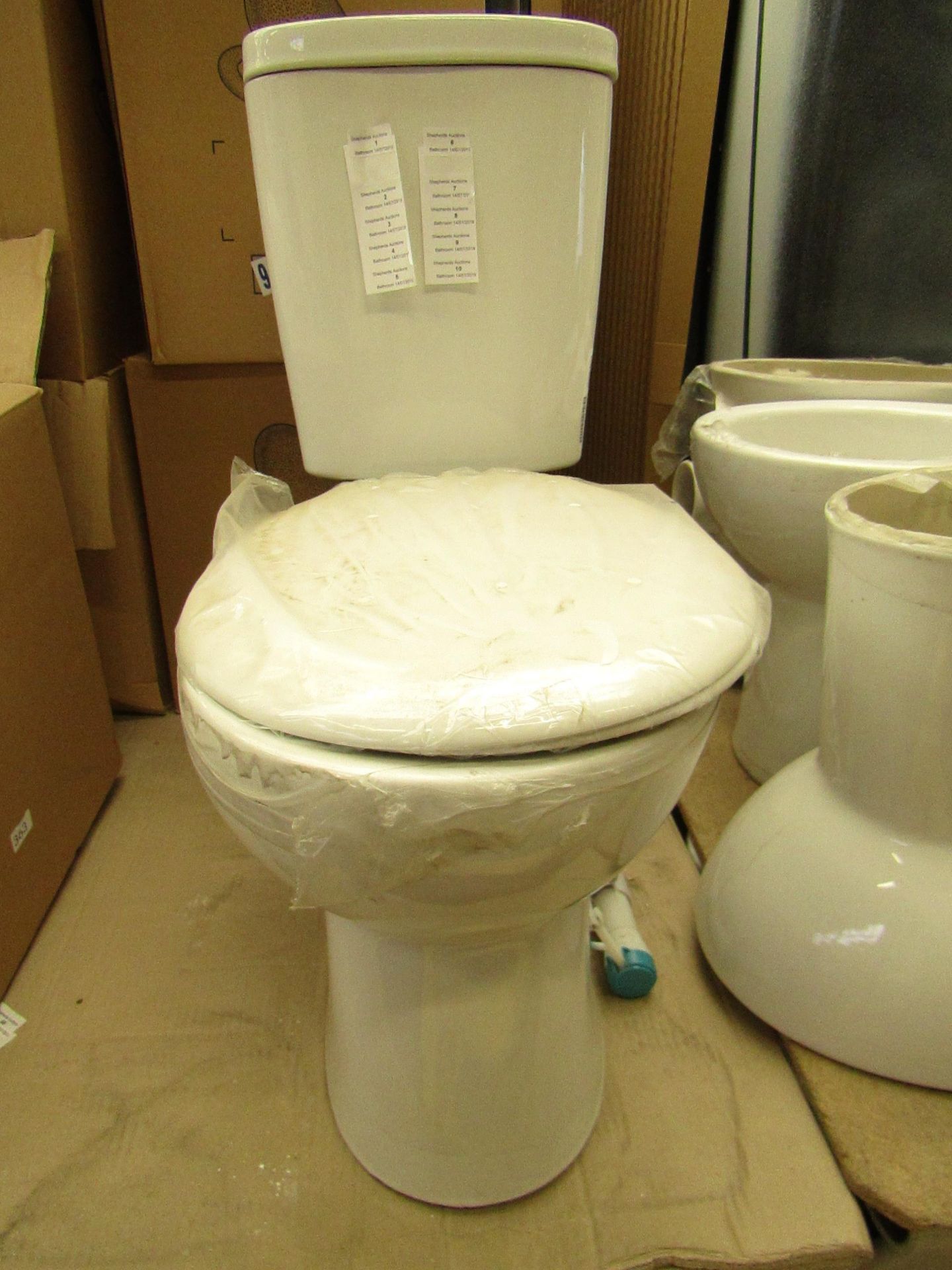 Unbranded Roca WC toilet pan and cistern with flush tank, all brand new.