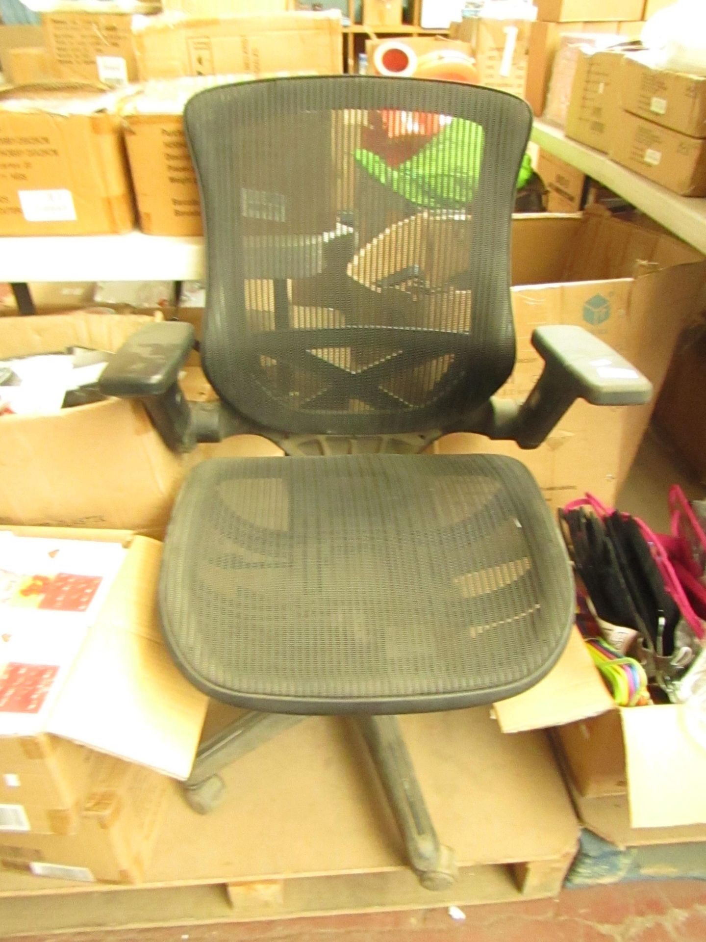 Mesh style desk/office chair.Height adjust doesnt work.