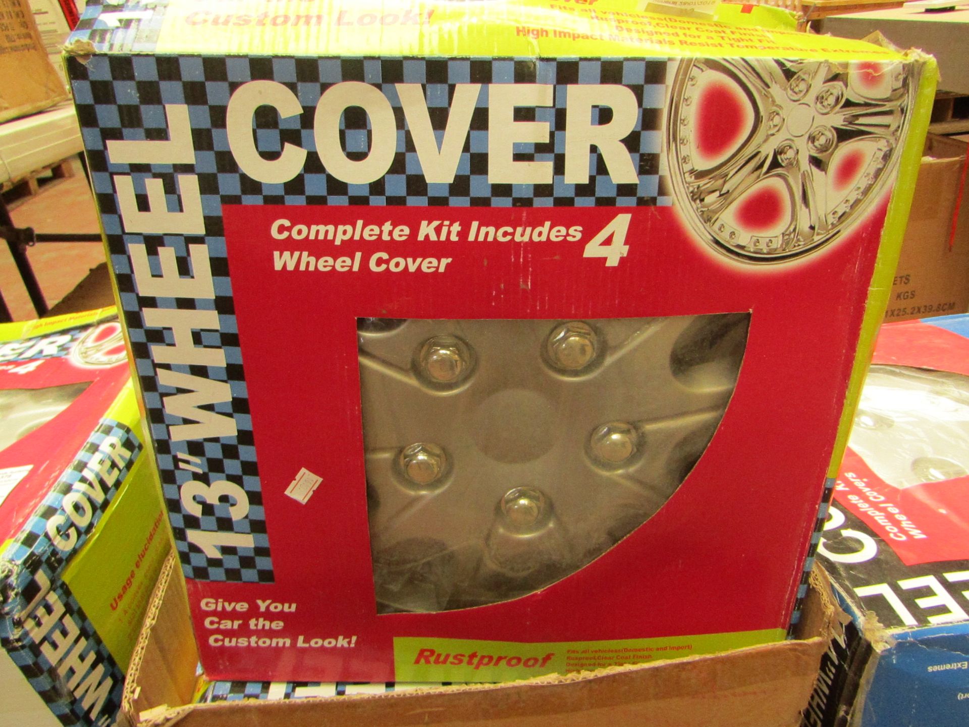 Set of 4 13" wheel covers, new and boxed.