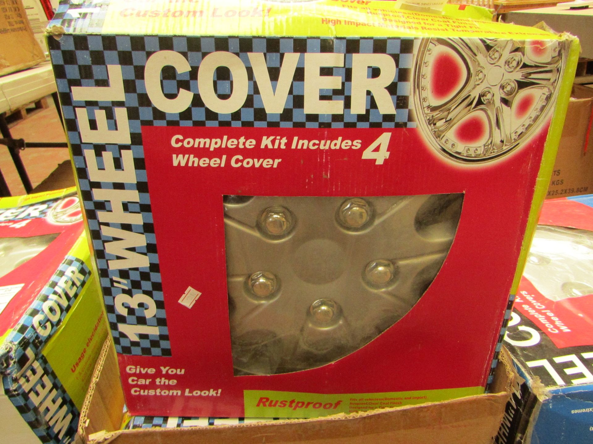 Set of 4 13" wheel covers, new and boxed.