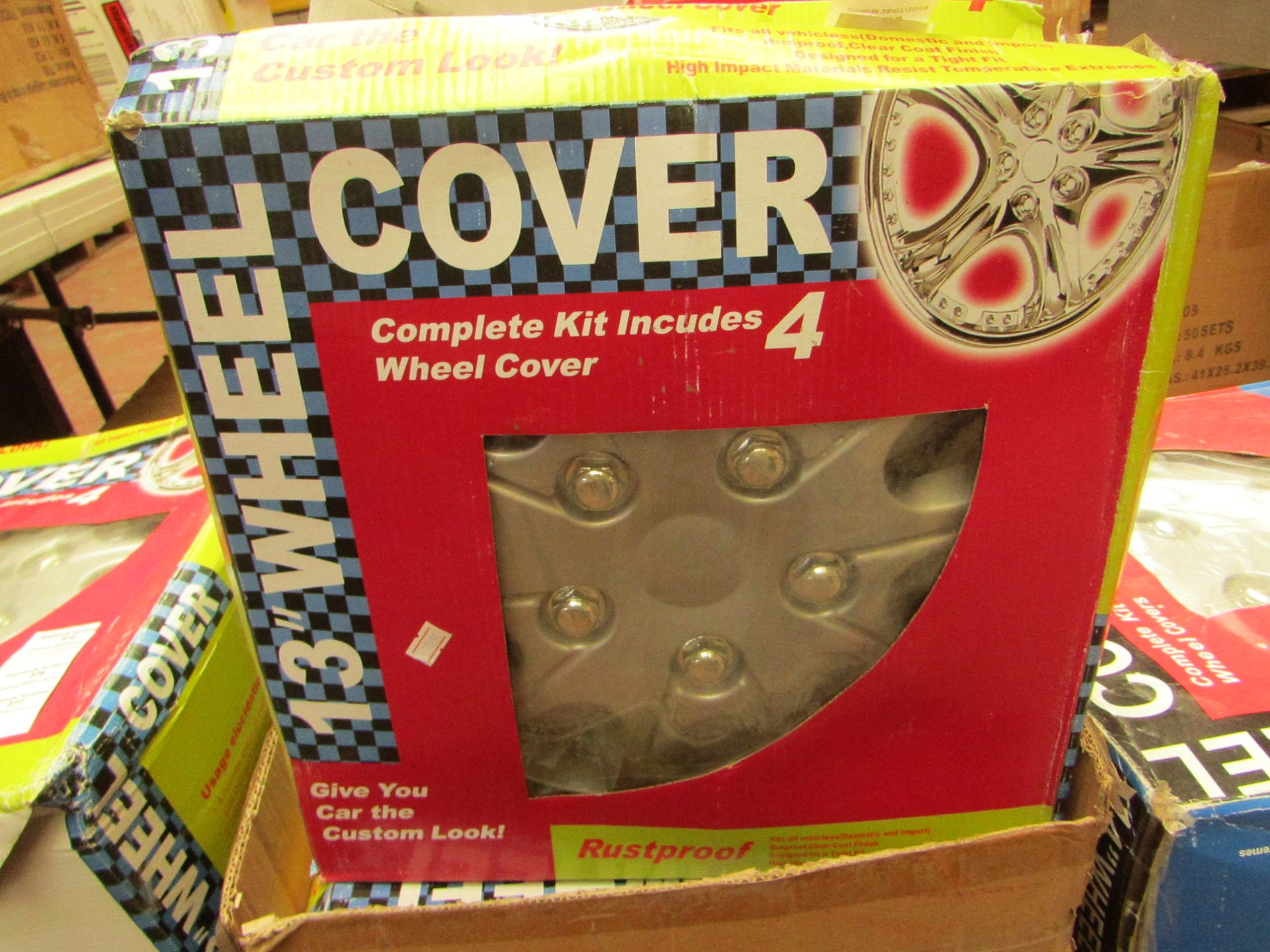 Set of 4 13" wheel covers, new and boxed.