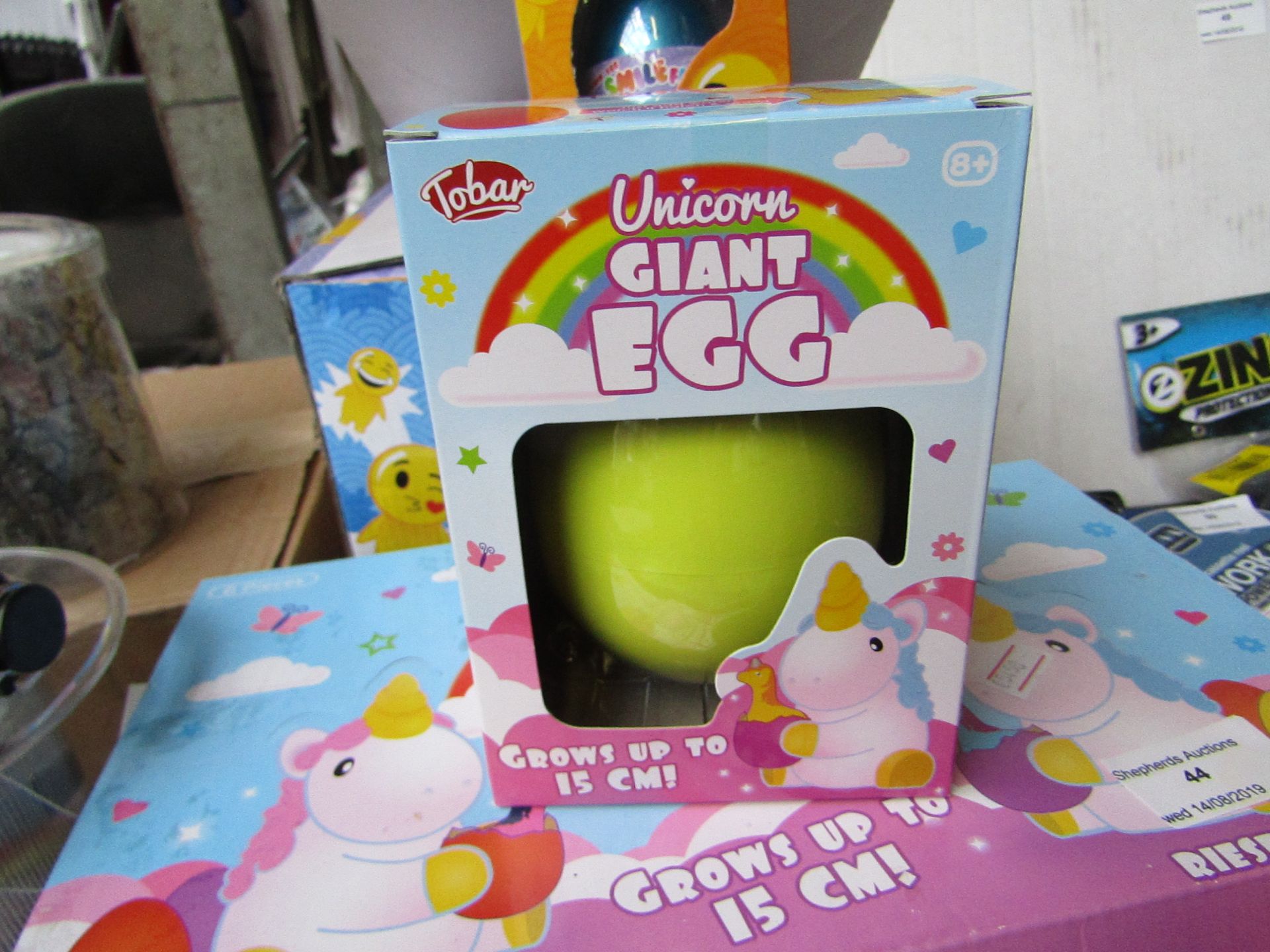 Display box of 6x Unicorn Giant Egg, new and boxed.