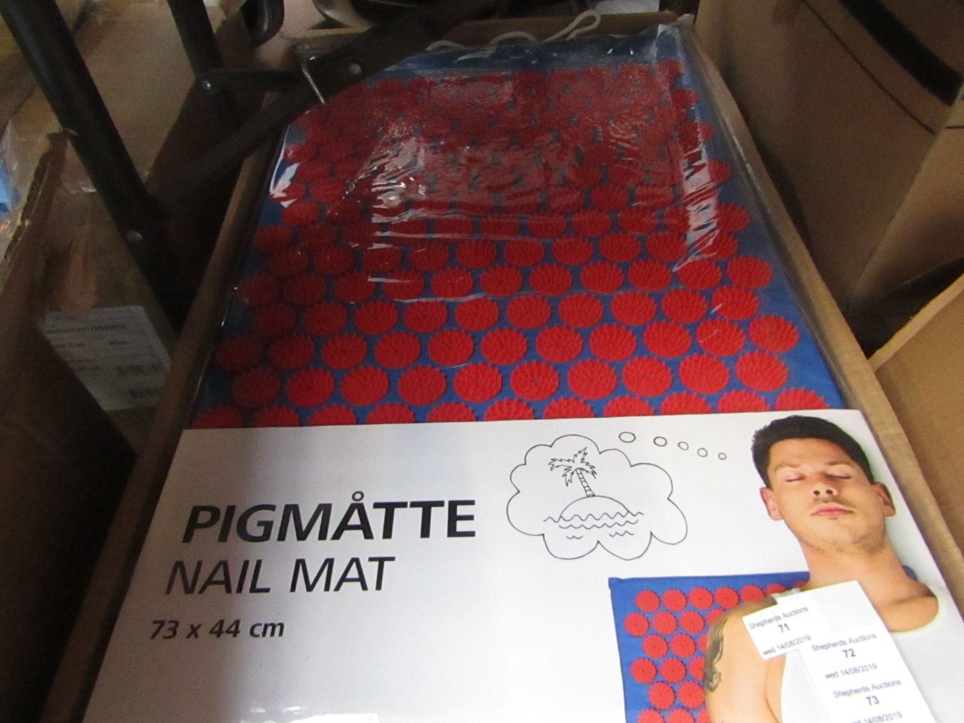 Tiger nail mat, 73 x 44cm, new and packaged.