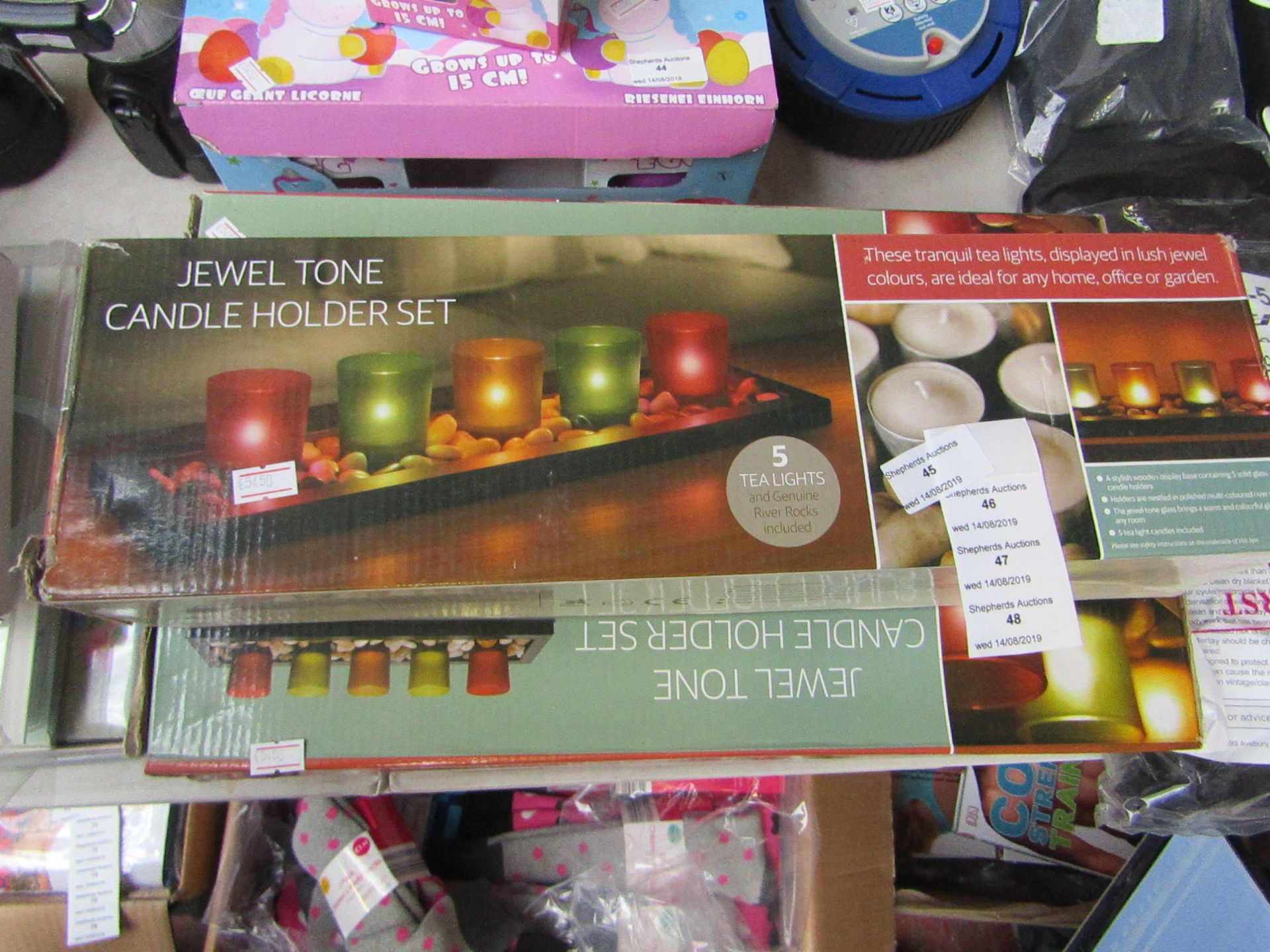 Jewel Tone candle holder set, new and boxed.