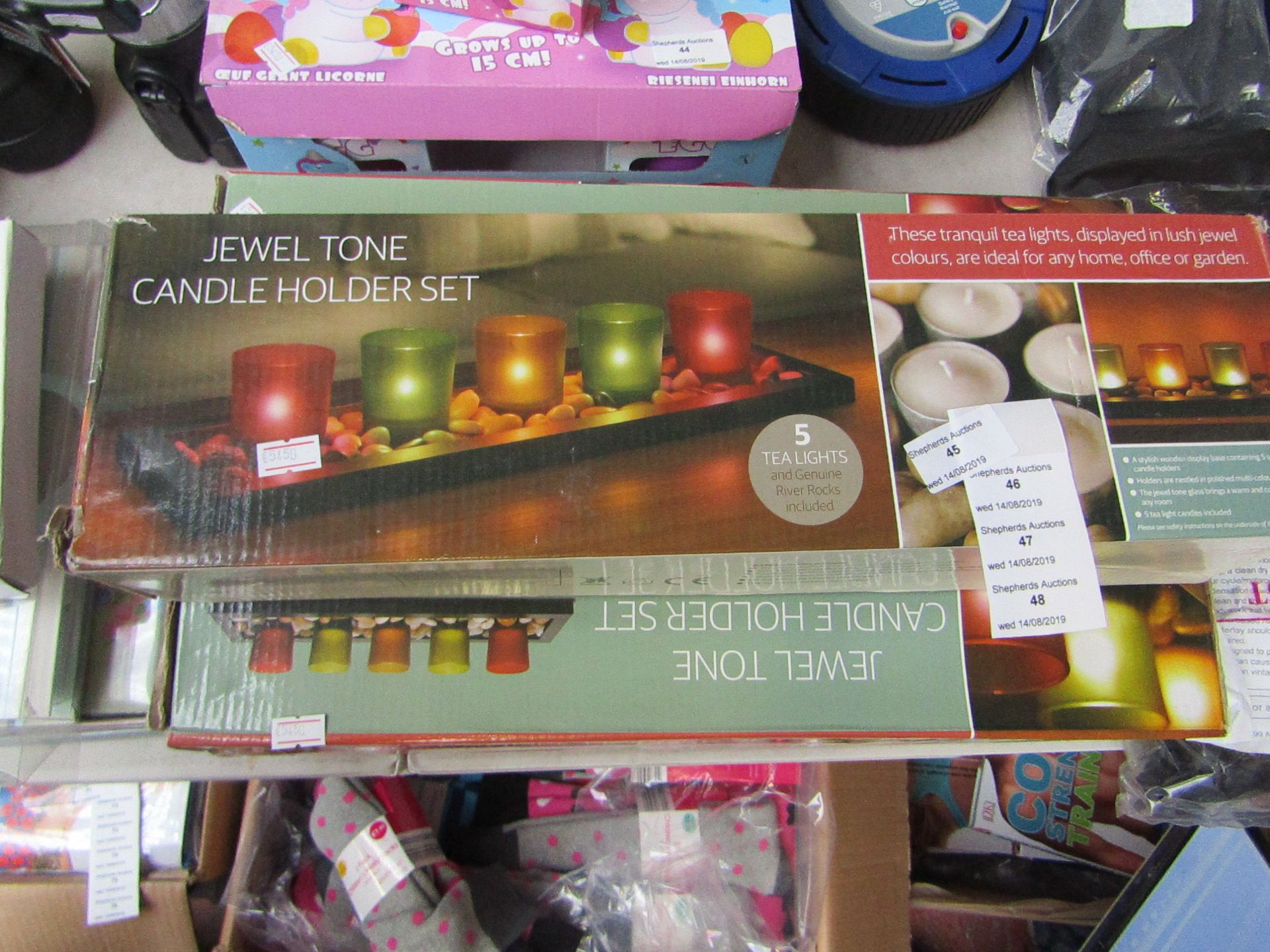 Jewel Tone candle holder set, new and boxed.