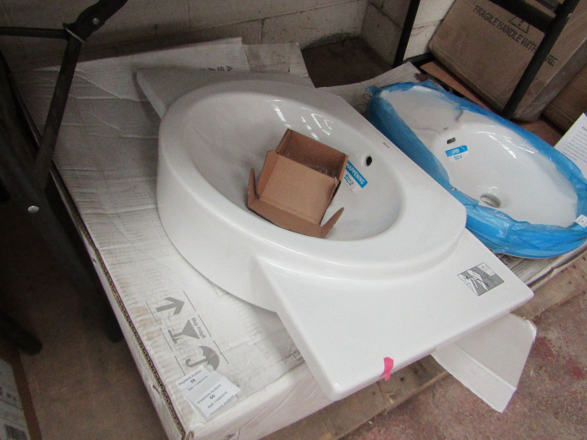 Roca Happening wall mounted sink, new and boxed, RRP œ425, waste in picture not included.