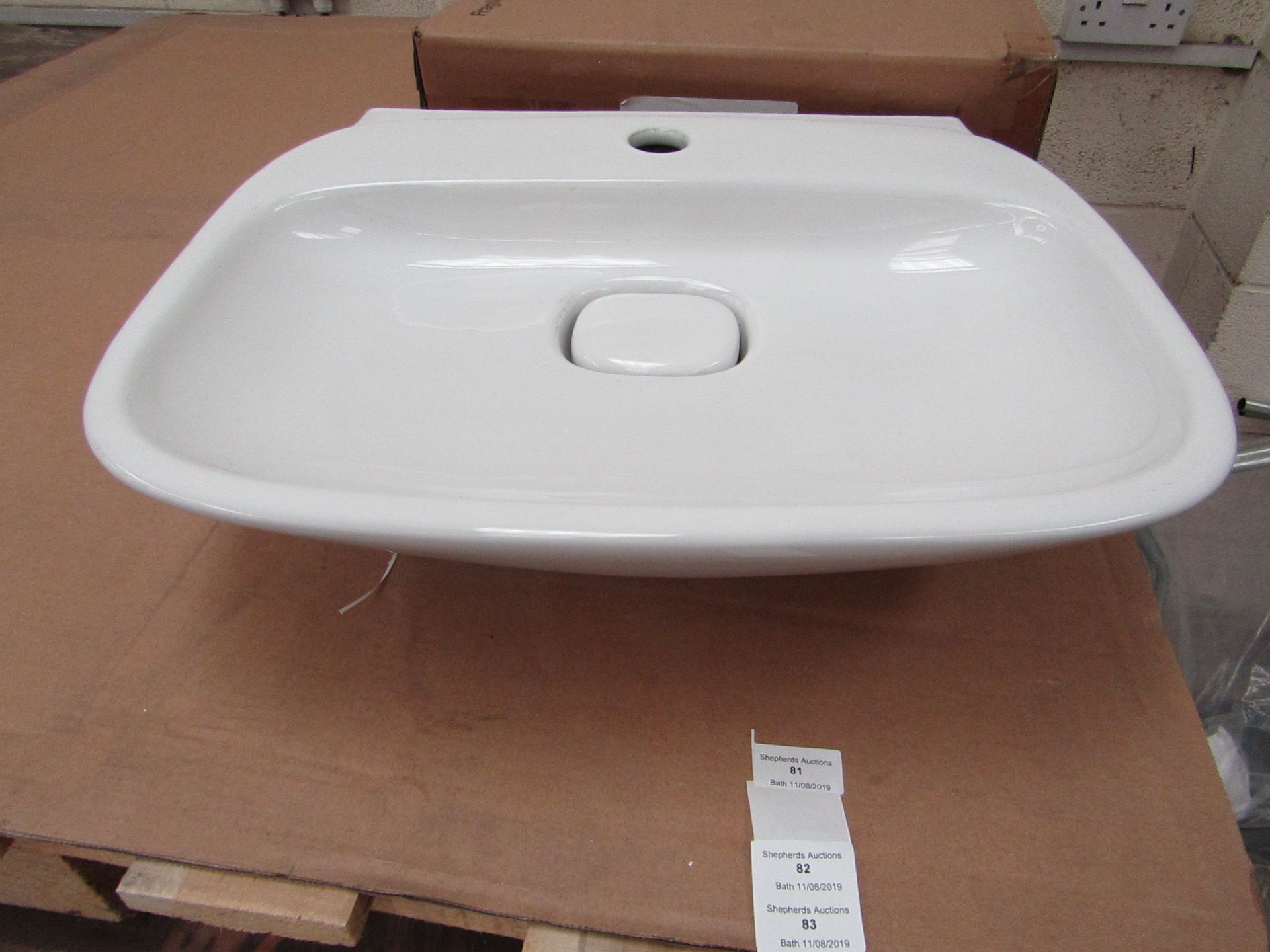 Laufen Made 500mm sink with ceramic plug cover, new and boxed