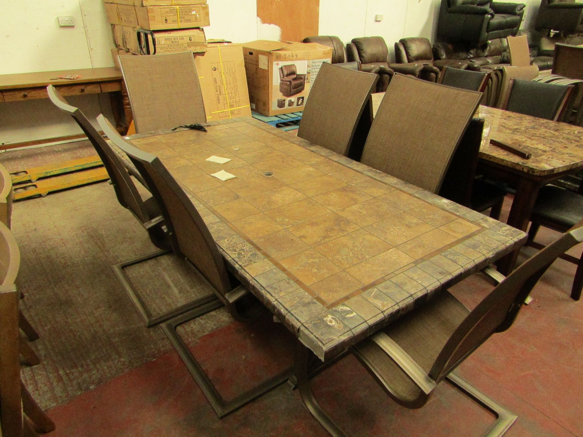 Costco Outdoor 6 seater outdoor dining set with 6 chairs, the tile top is damaged.
