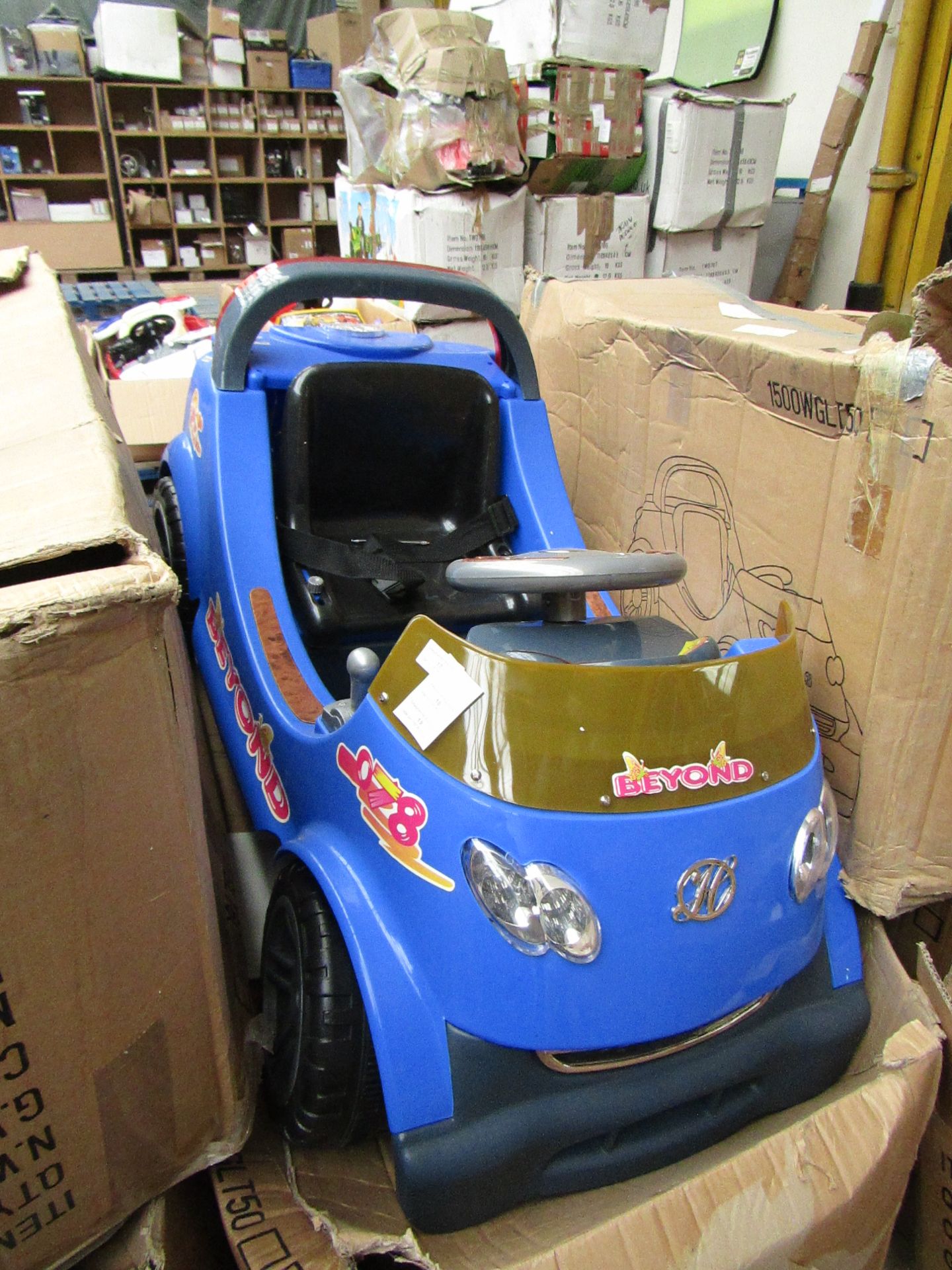 Childs Beyond electric ride on car in blue, boxed and unchecked, please read lot 0