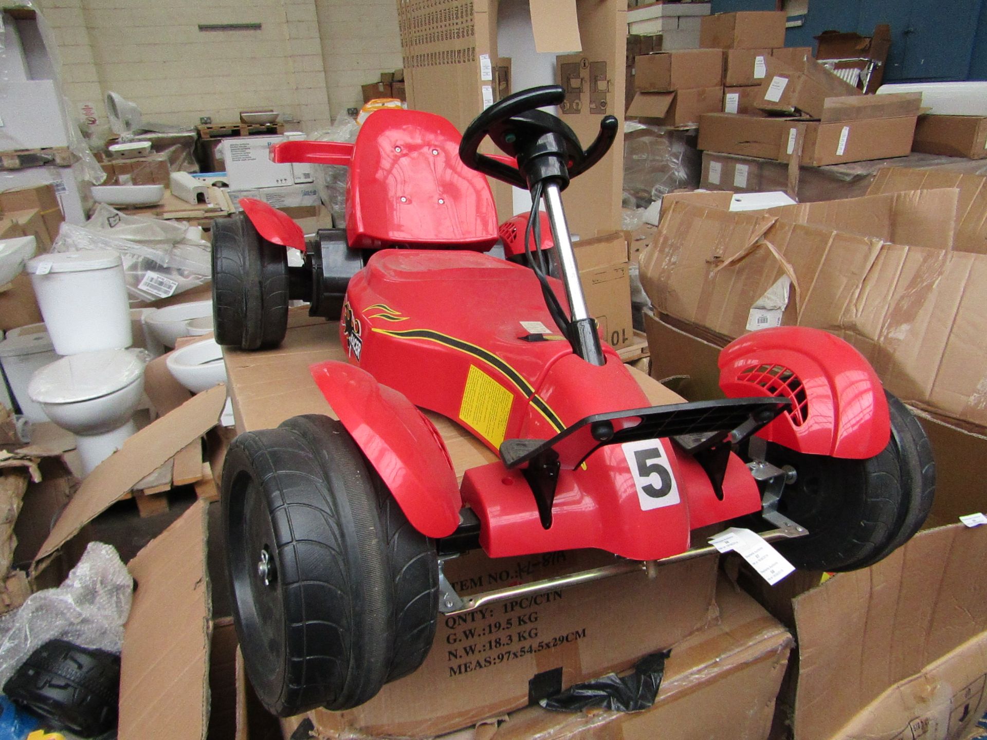 Childs Red racer electric kart, boxed and untested, please read lot 0