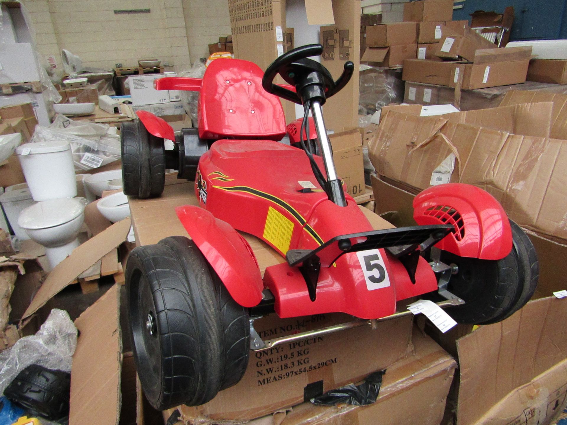 Childs Red racer electric kart, boxed and untested, please read lot 0