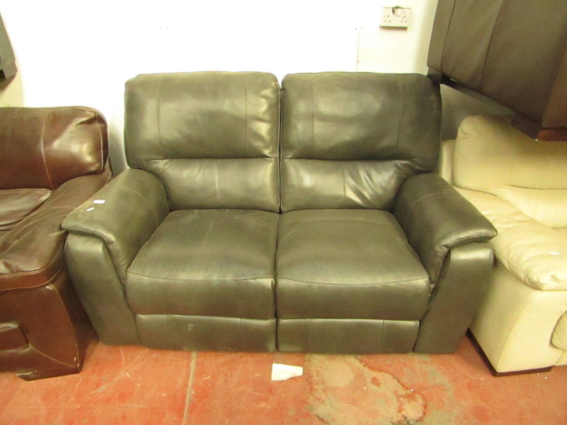 Costco 2 seater manual reclining sofa, the reclining part is working and the sofa has no major
