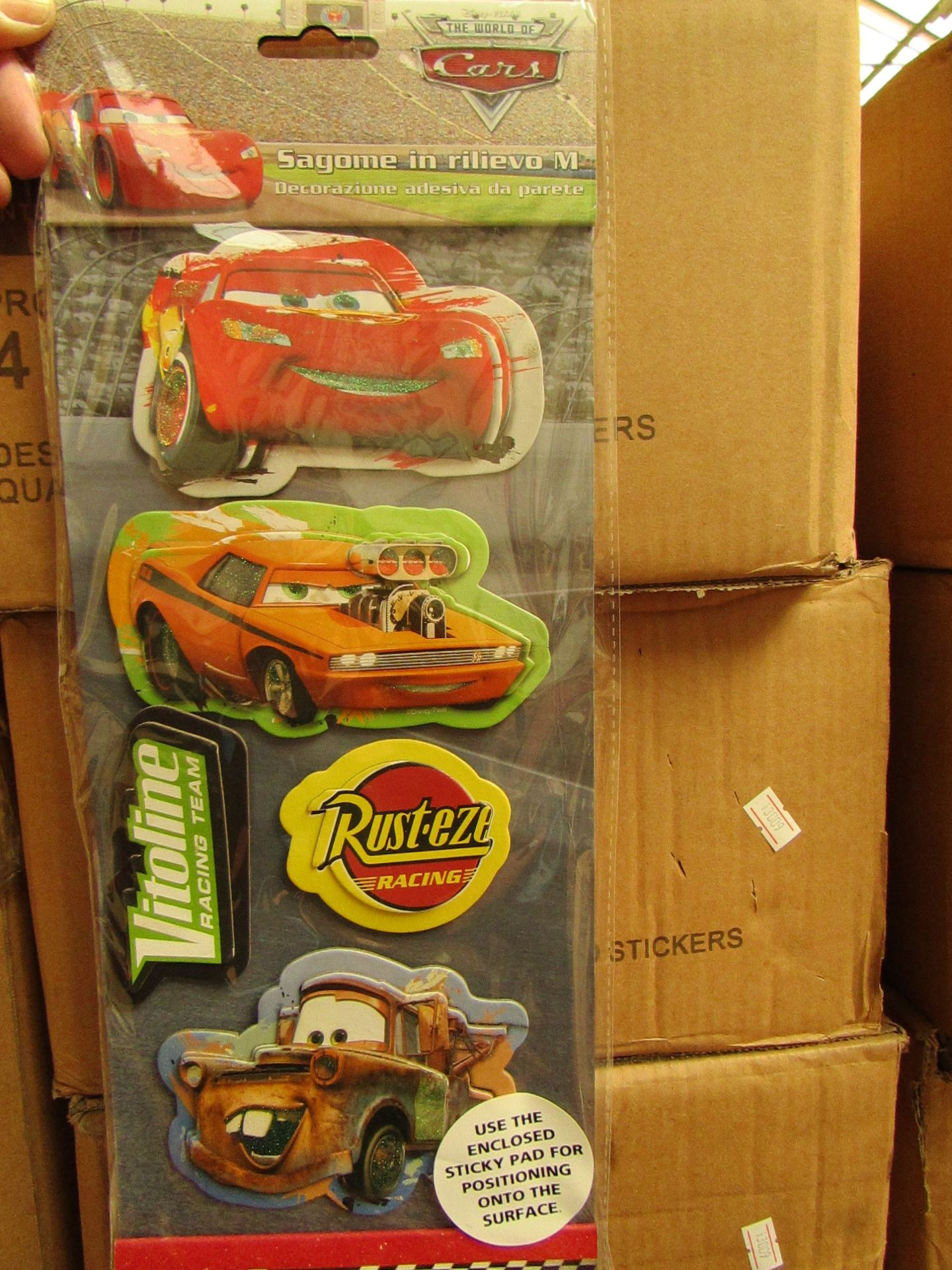 box  of 48 packs of Cars 2 3D Sticker Sets packaged