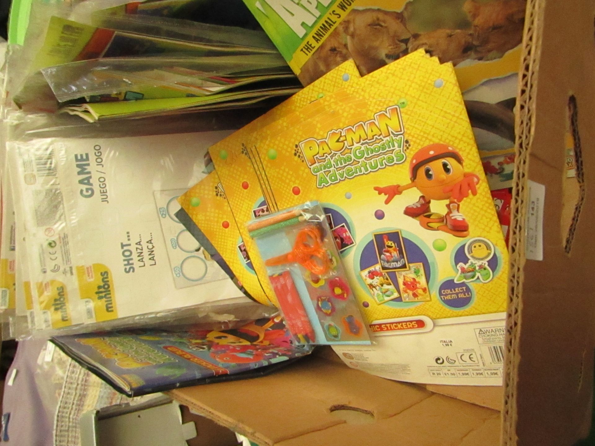 box of various items being 20 x Minions Games, Minion Sticker Sets, Pacman Sticker Books & Animal