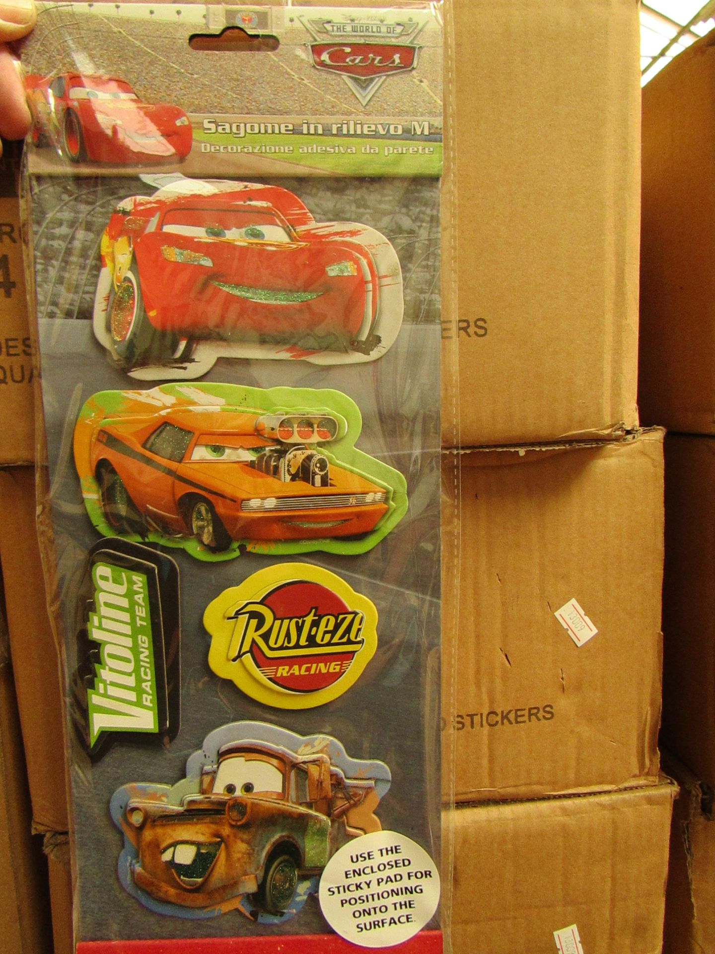 box  of 48 packs of Cars 2 3D Sticker Sets packaged