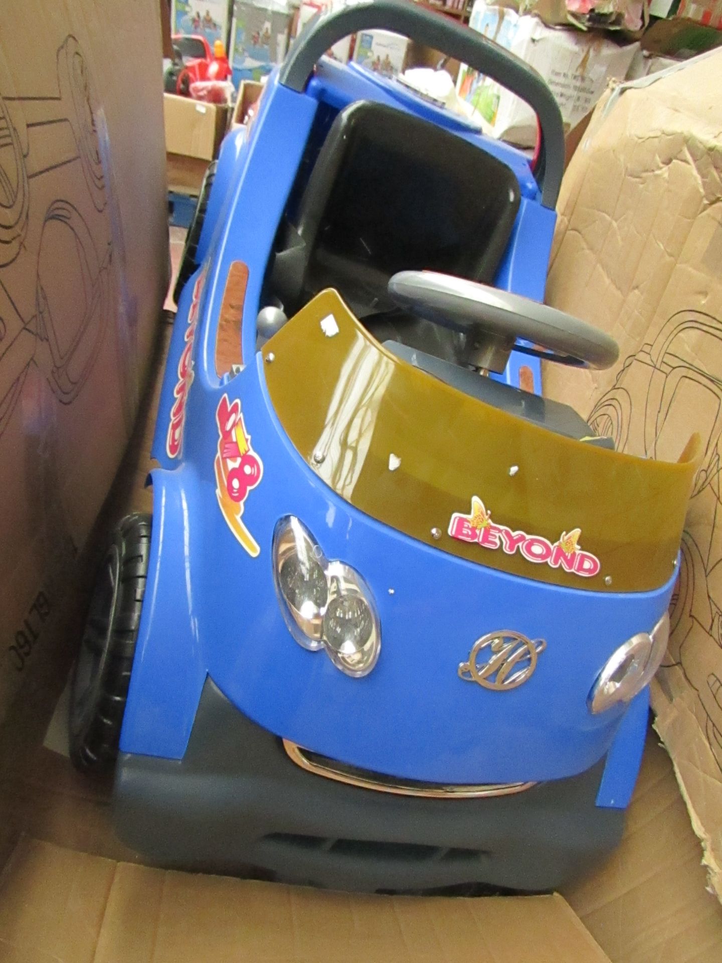 Childs Beyond electric ride on car in blue, boxed and unchecked, please read lot 0