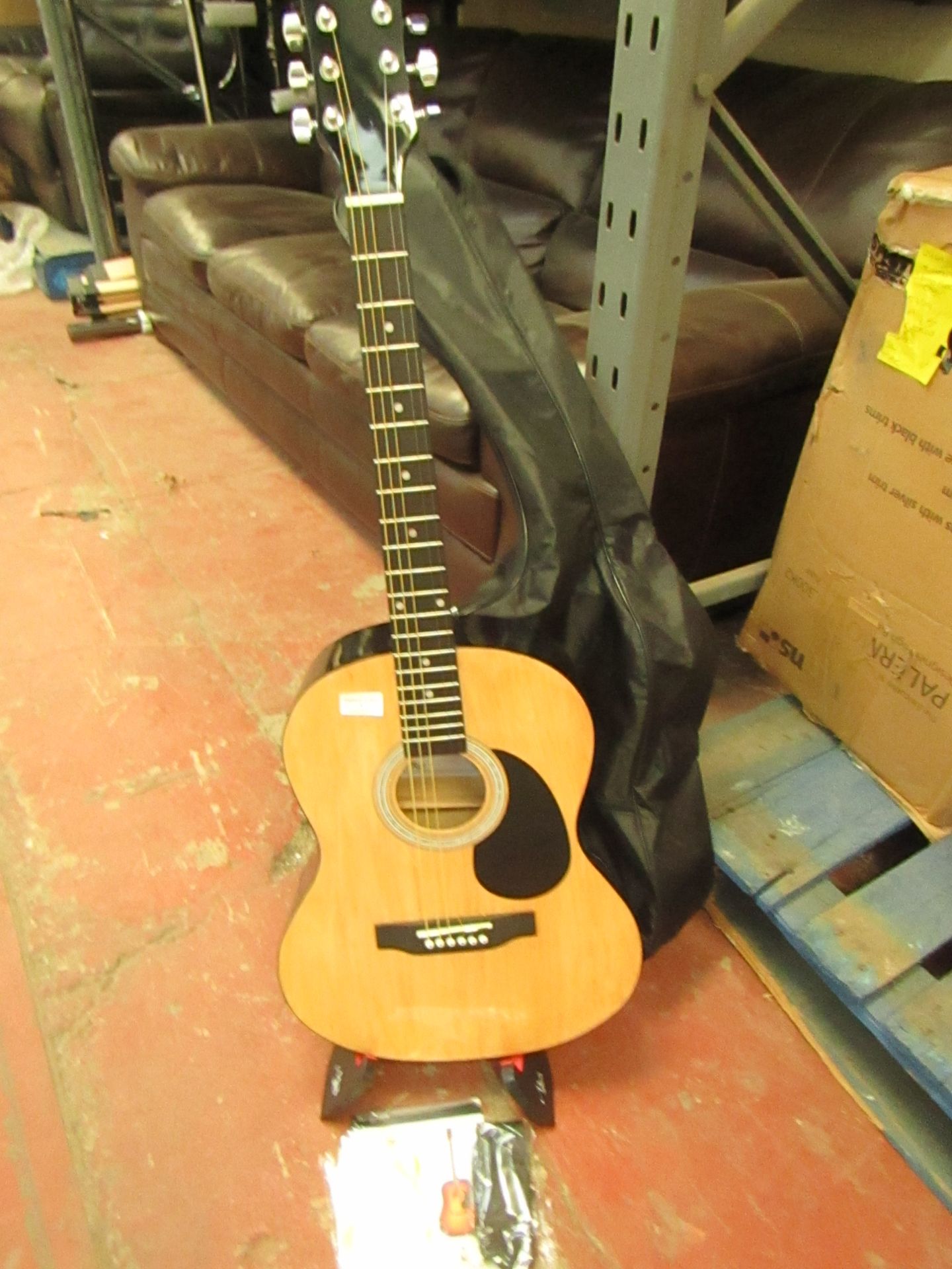 Martin Smith Acoustic Guitar with Carry bag, stand and what looks like spare strings, one of the