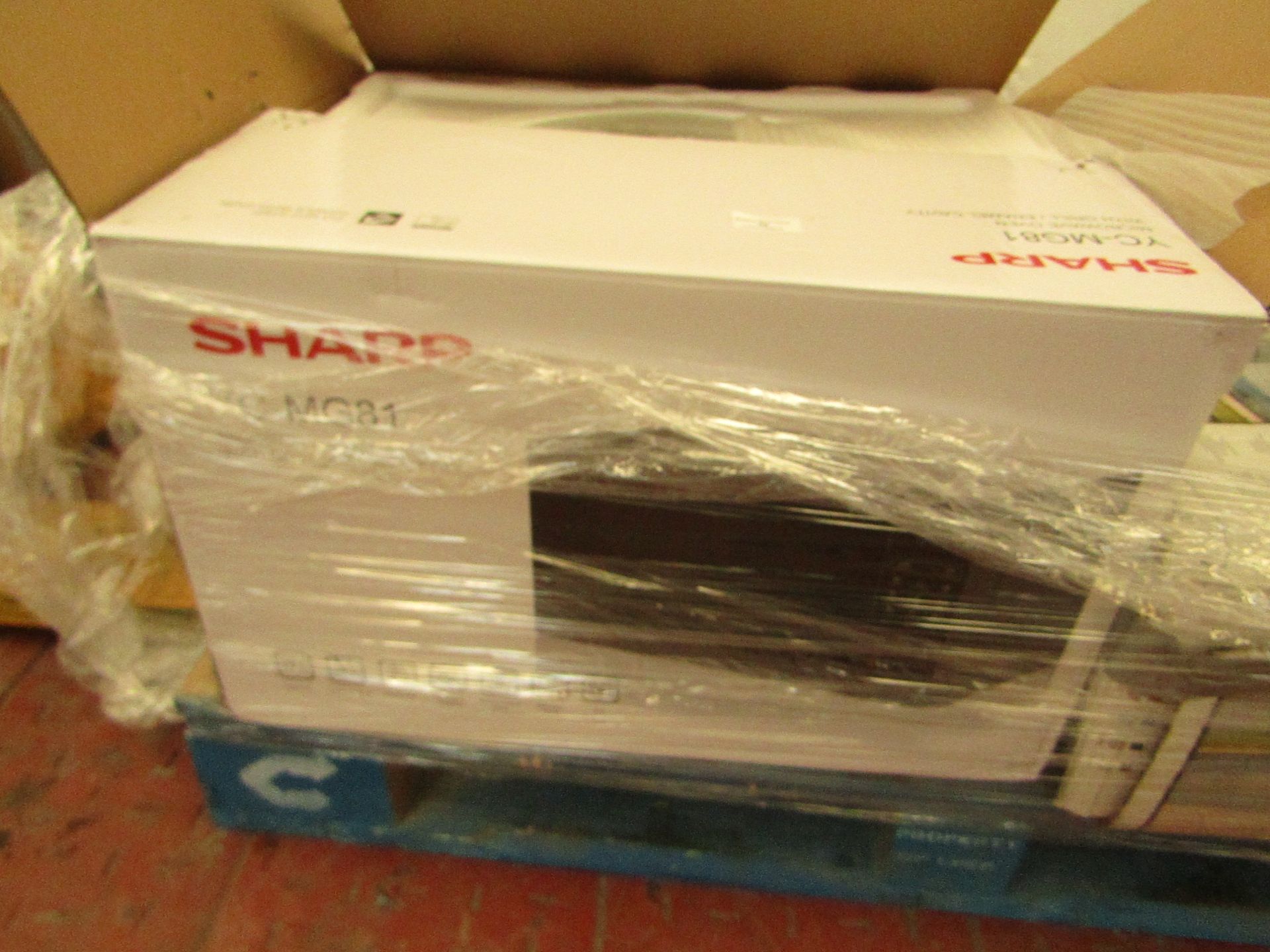 Sharp Digital microwave with Grill, tested working in original box.