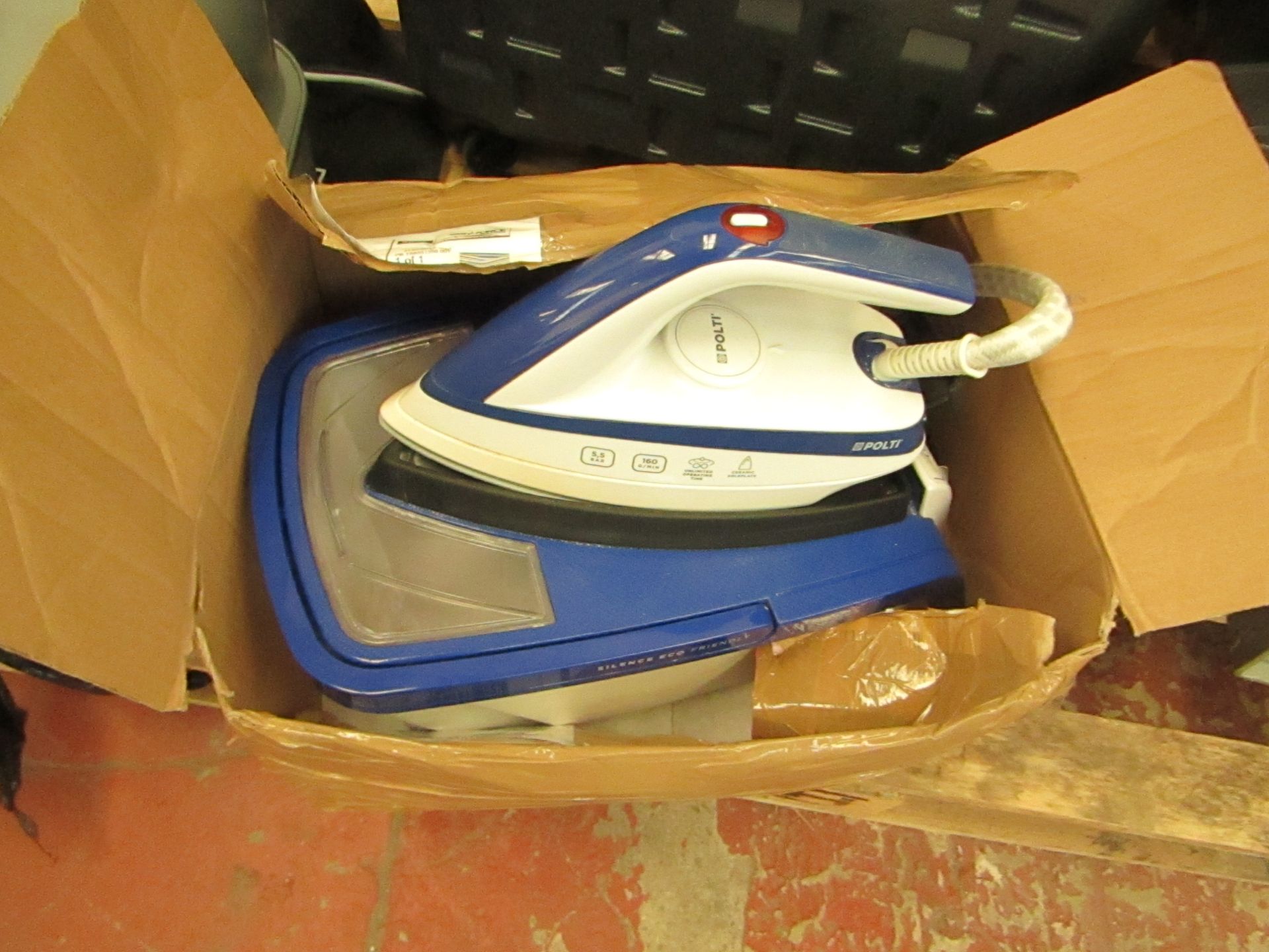 Polti Violetti steam generator iron, powers on and heats up.