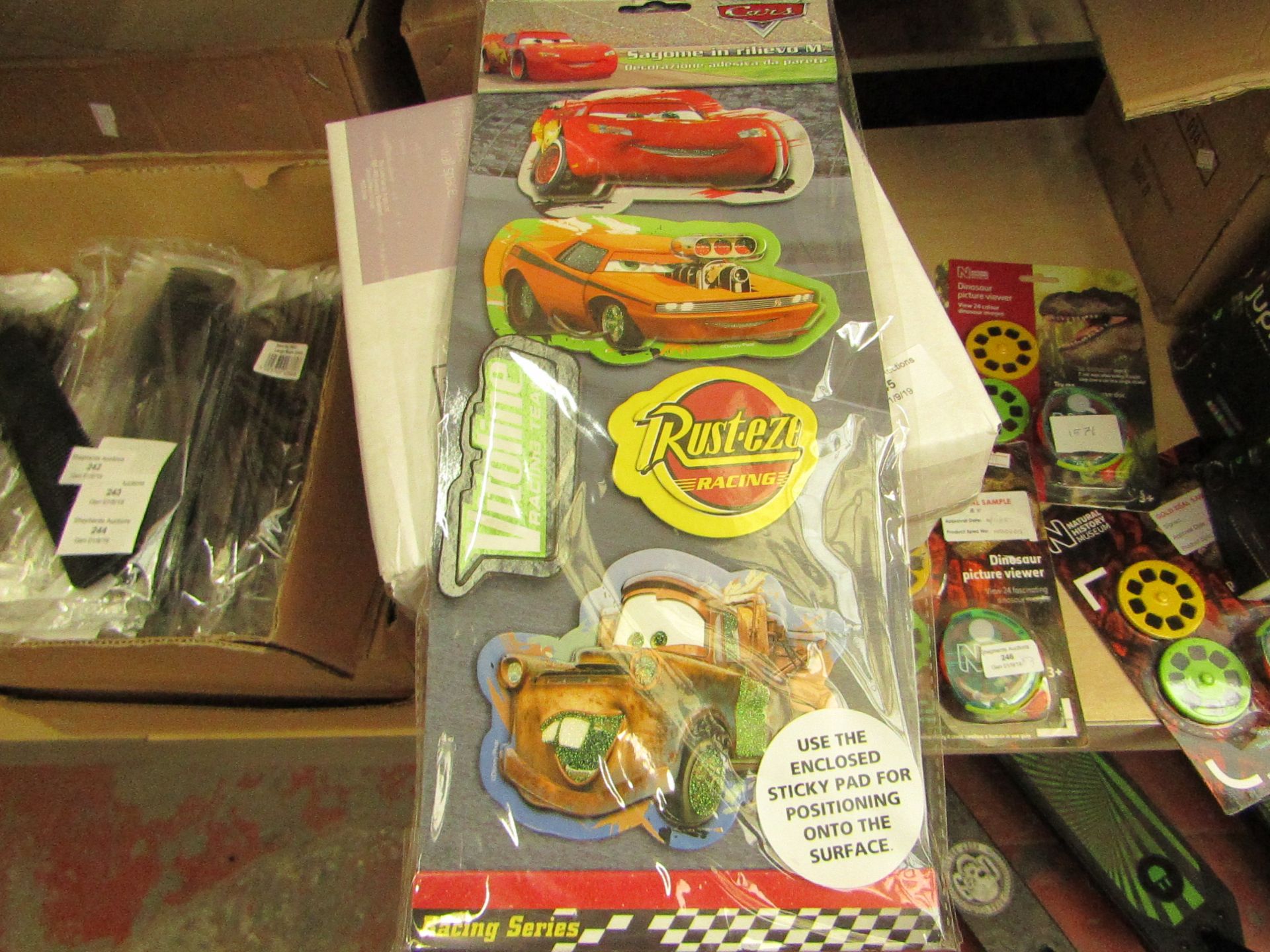 box of 48 packs of Cars 2 3D Sticker Sets packaged