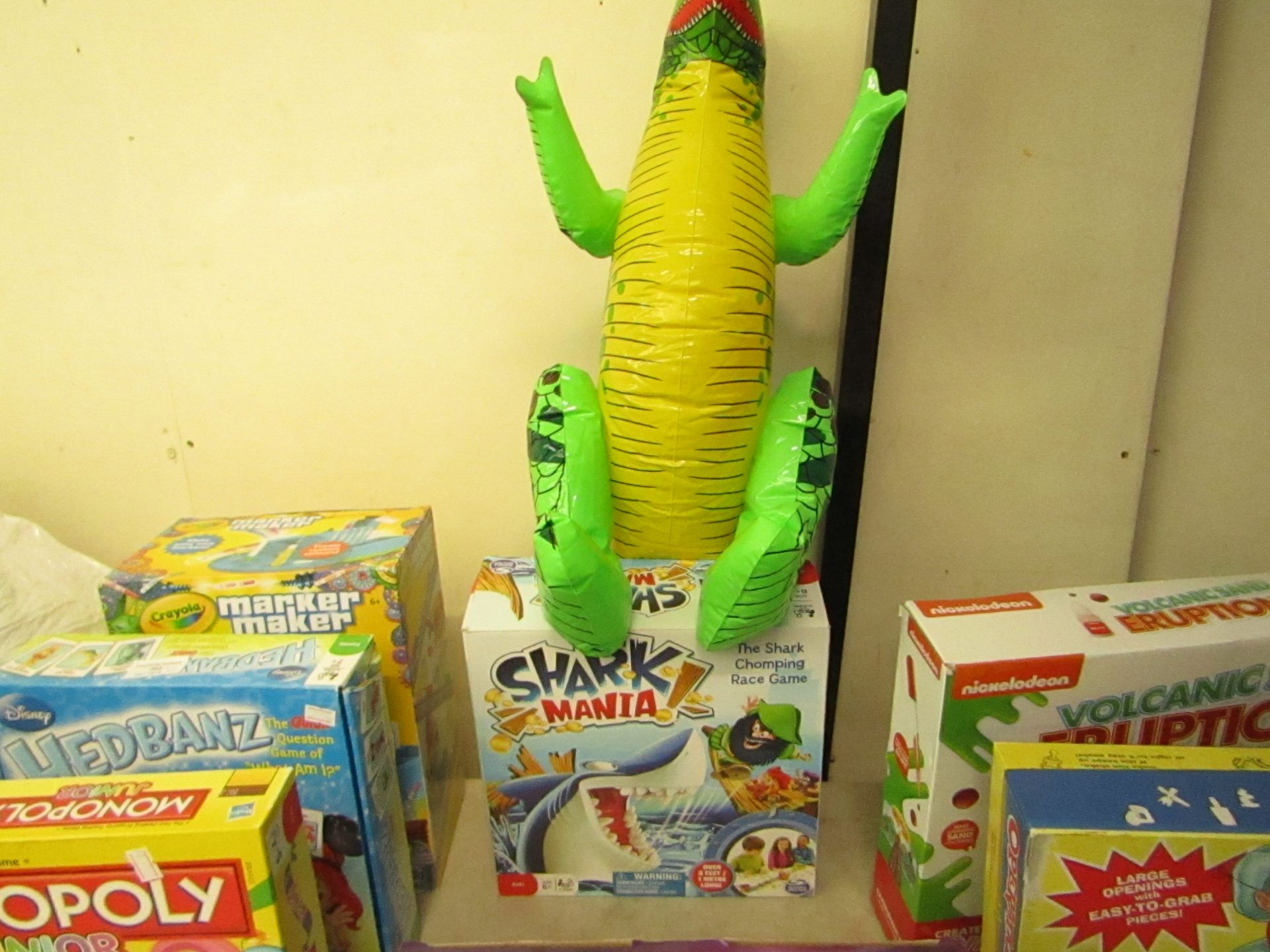 2 x items being 1 x Blow Up Dino and 1 x Shark Mania Board Game, Both Unchecked and Boxed