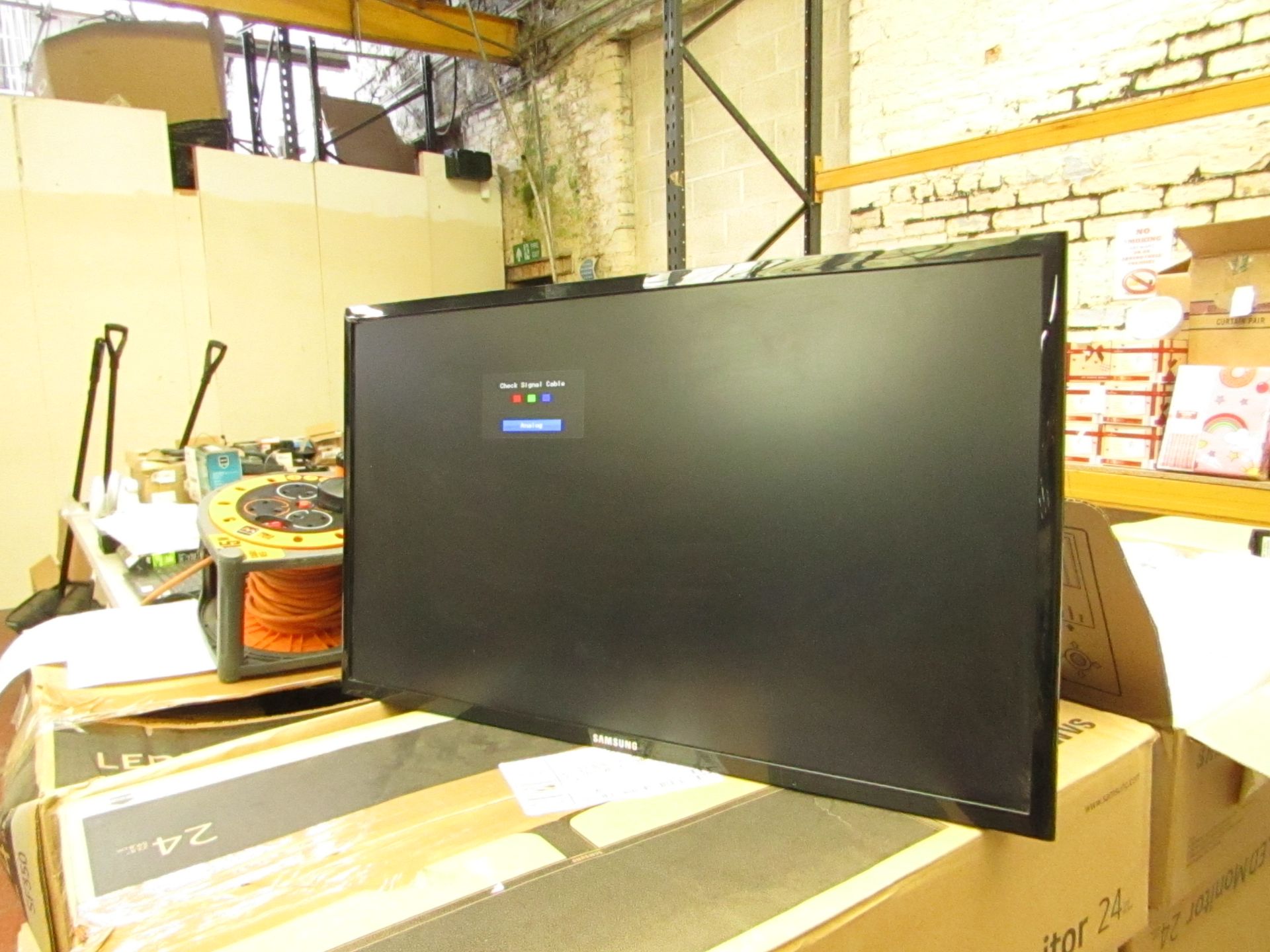 Samsung S24F350FHU 24" LED monitor, tested working and only has cosmetic damage to the frame which