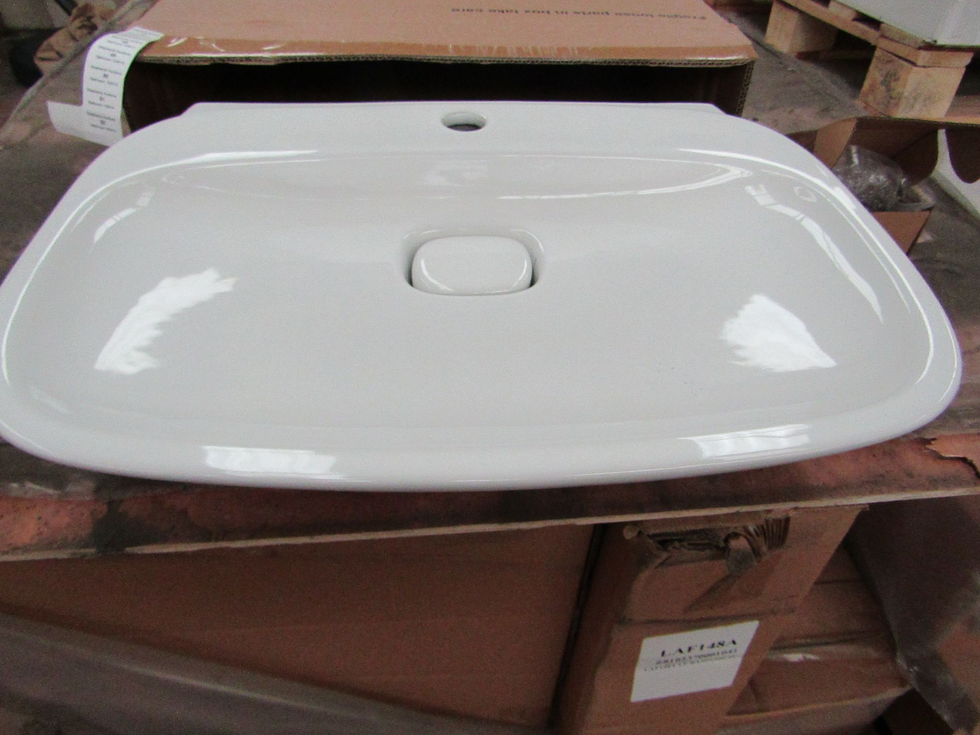 Laufen Made 60cm Sink with Ceramic plug hole cover, new and boxed