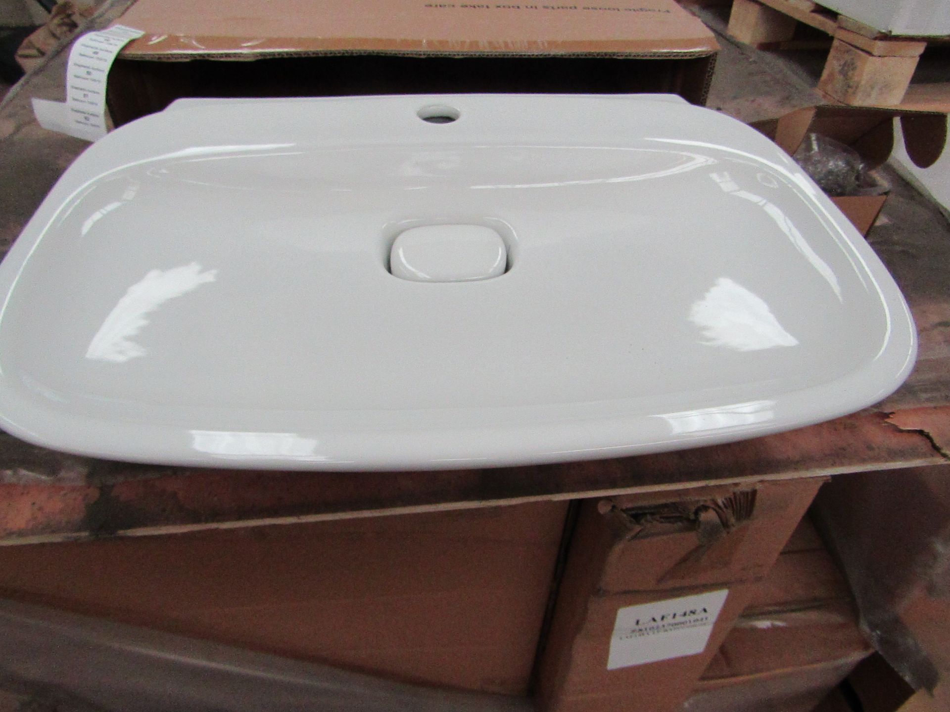 Laufen Made 60cm Sink with Ceramic plug hole cover, new and boxed