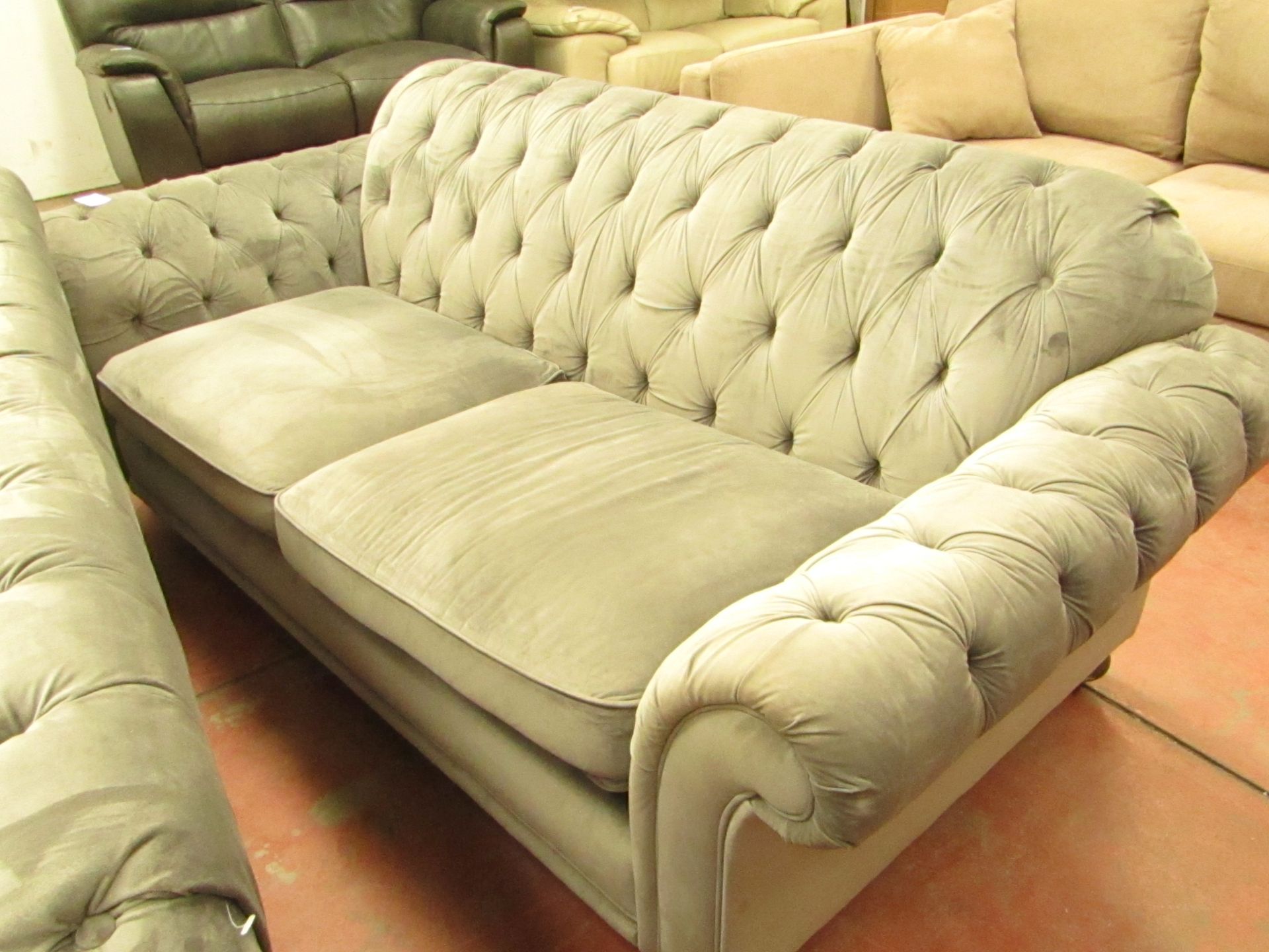 Three Seater, 2 cushion Crushed velvet button back sofa.