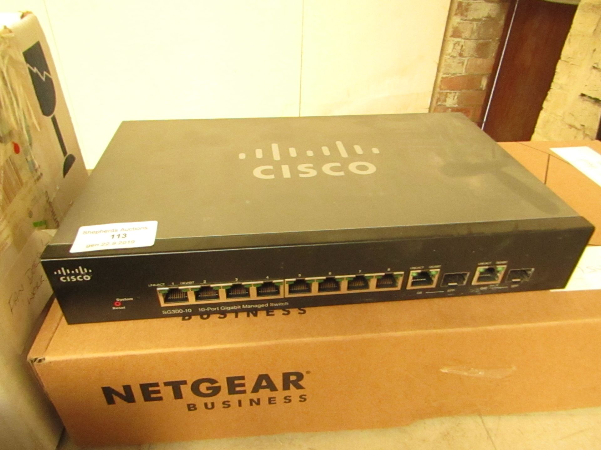 Cisco Netgear 10 port Gigabit managed switch, RRP £116 on Ebuyer.com boxed unchecked