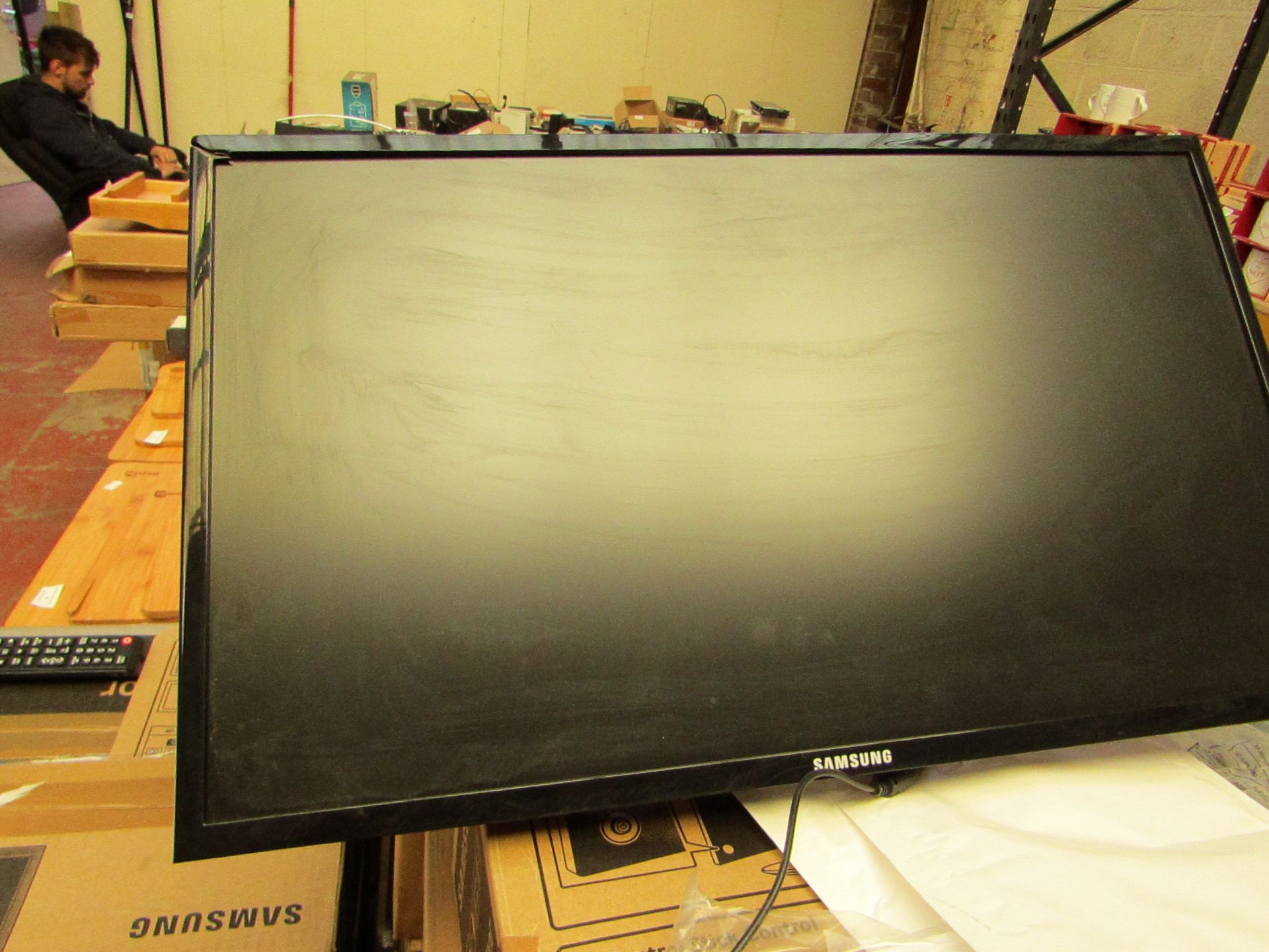 Samsung S24F350FHU 24" LED monitor, tested working and only has cosmetic damage to the frame which