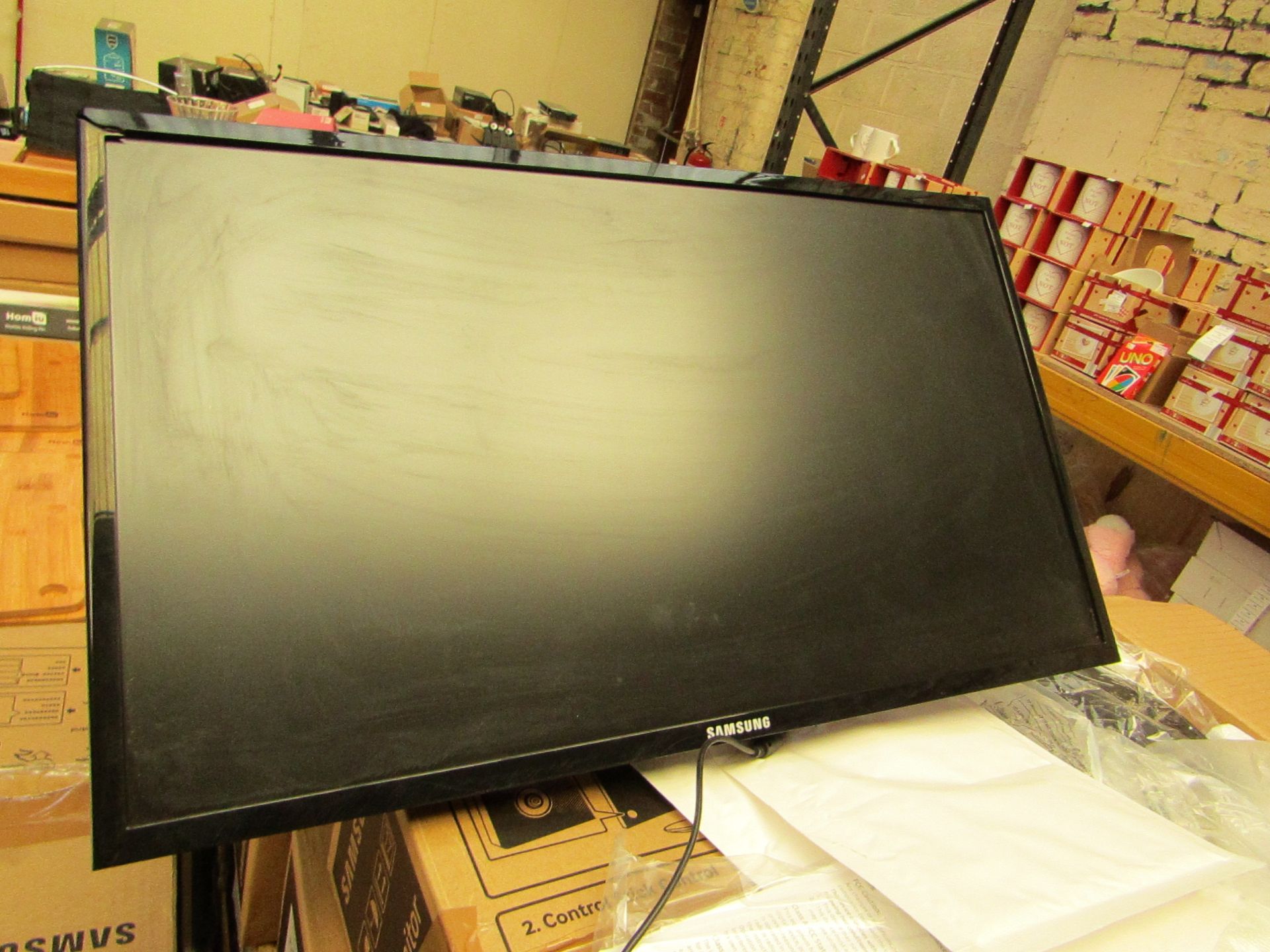 Samsung S24F350FHU 24" LED monitor, tested working and only has cosmetic damage to the frame which