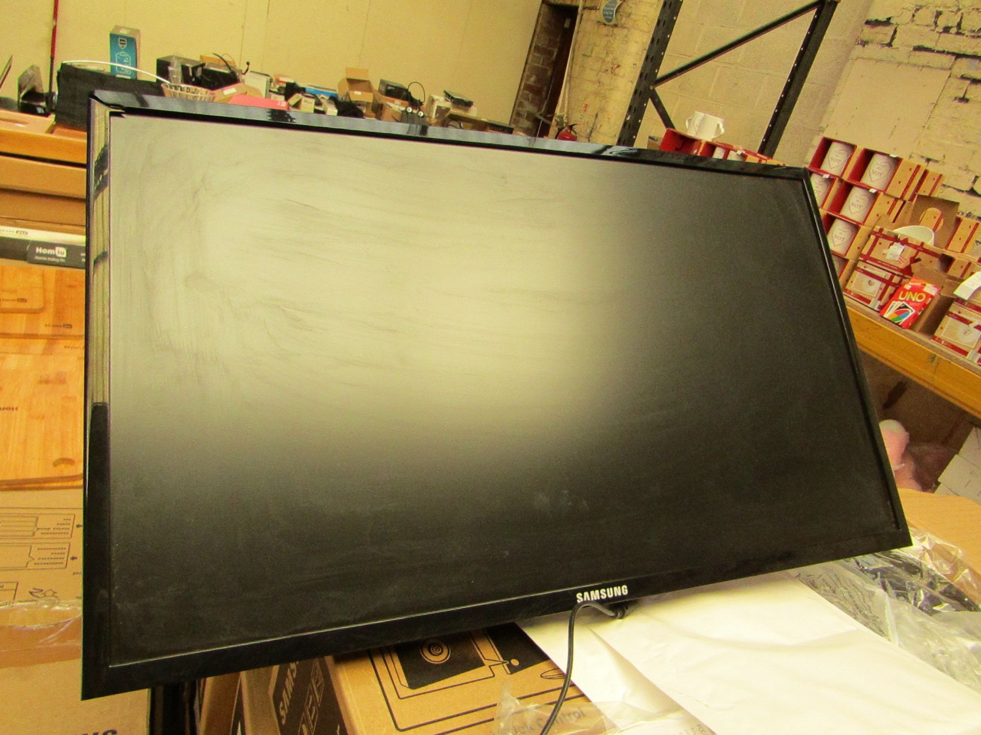 Samsung S24F350FHU 24" LED monitor, tested working and only has cosmetic damage to the frame which