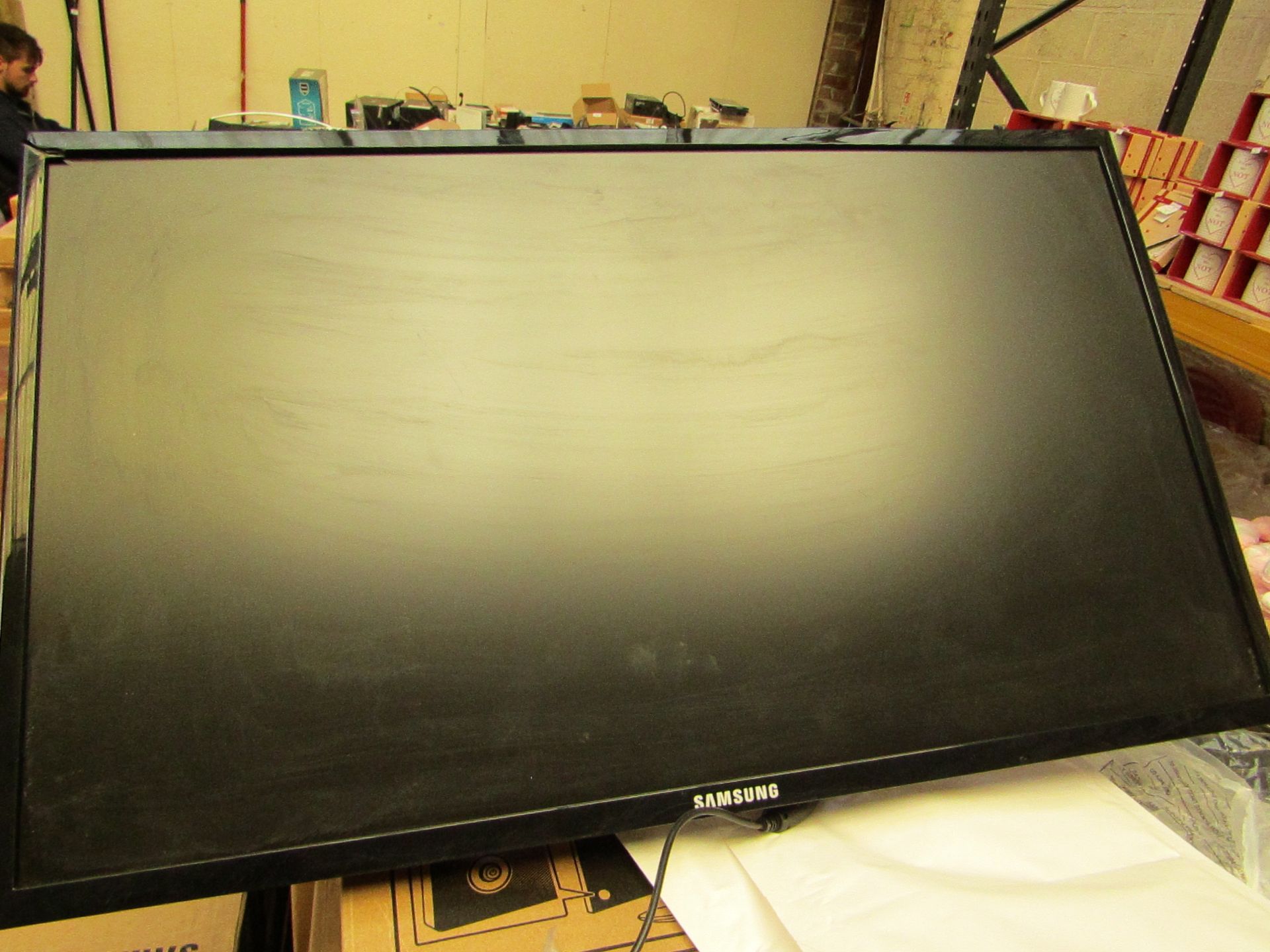 Samsung S24F350FHU 24" LED monitor, tested working and only has cosmetic damage to the frame which