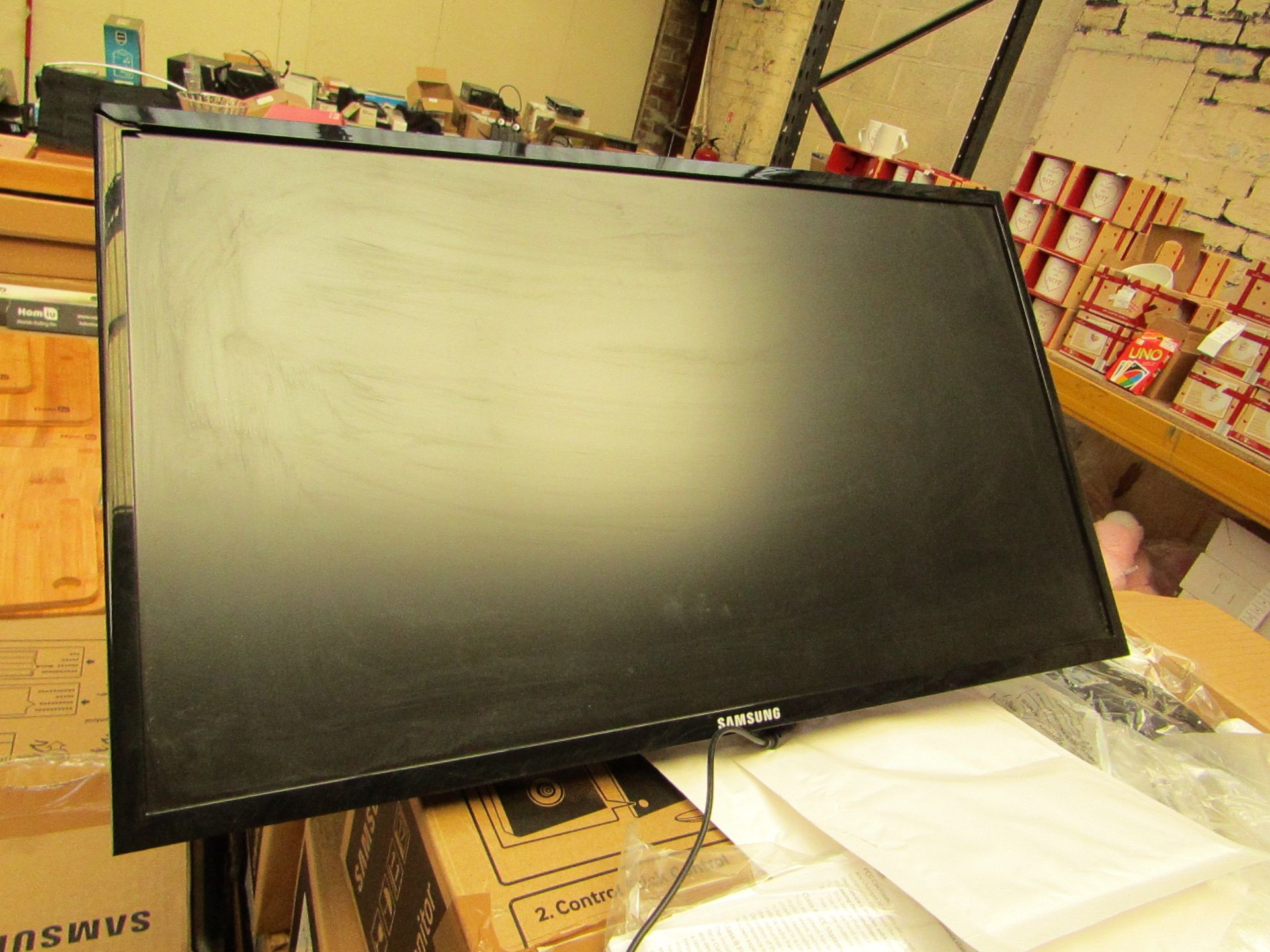 Samsung S24F350FHU 24" LED monitor, tested working and only has cosmetic damage to the frame which