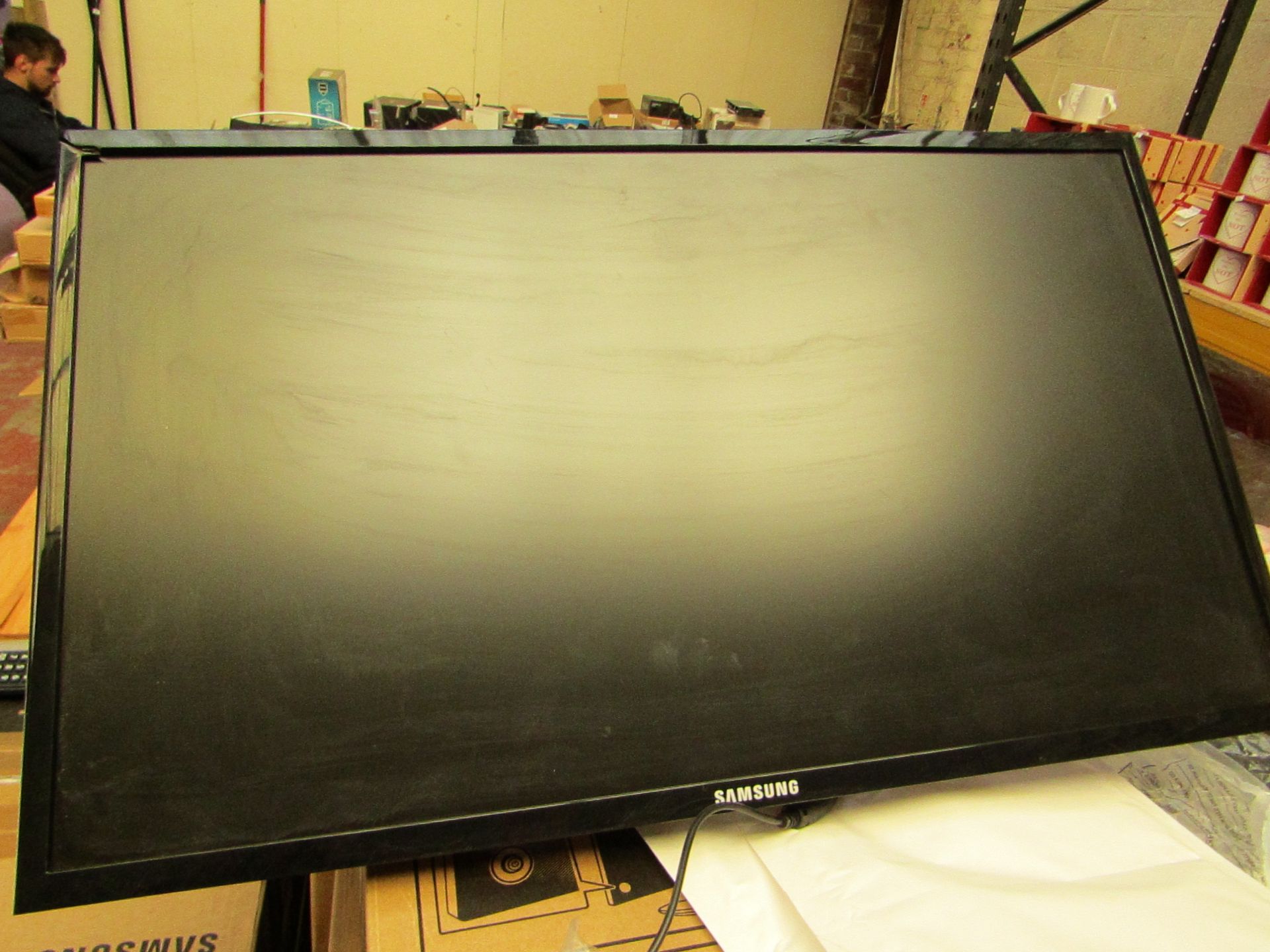 Samsung S24F350FHU 24" LED monitor, tested working and only has cosmetic damage to the frame which