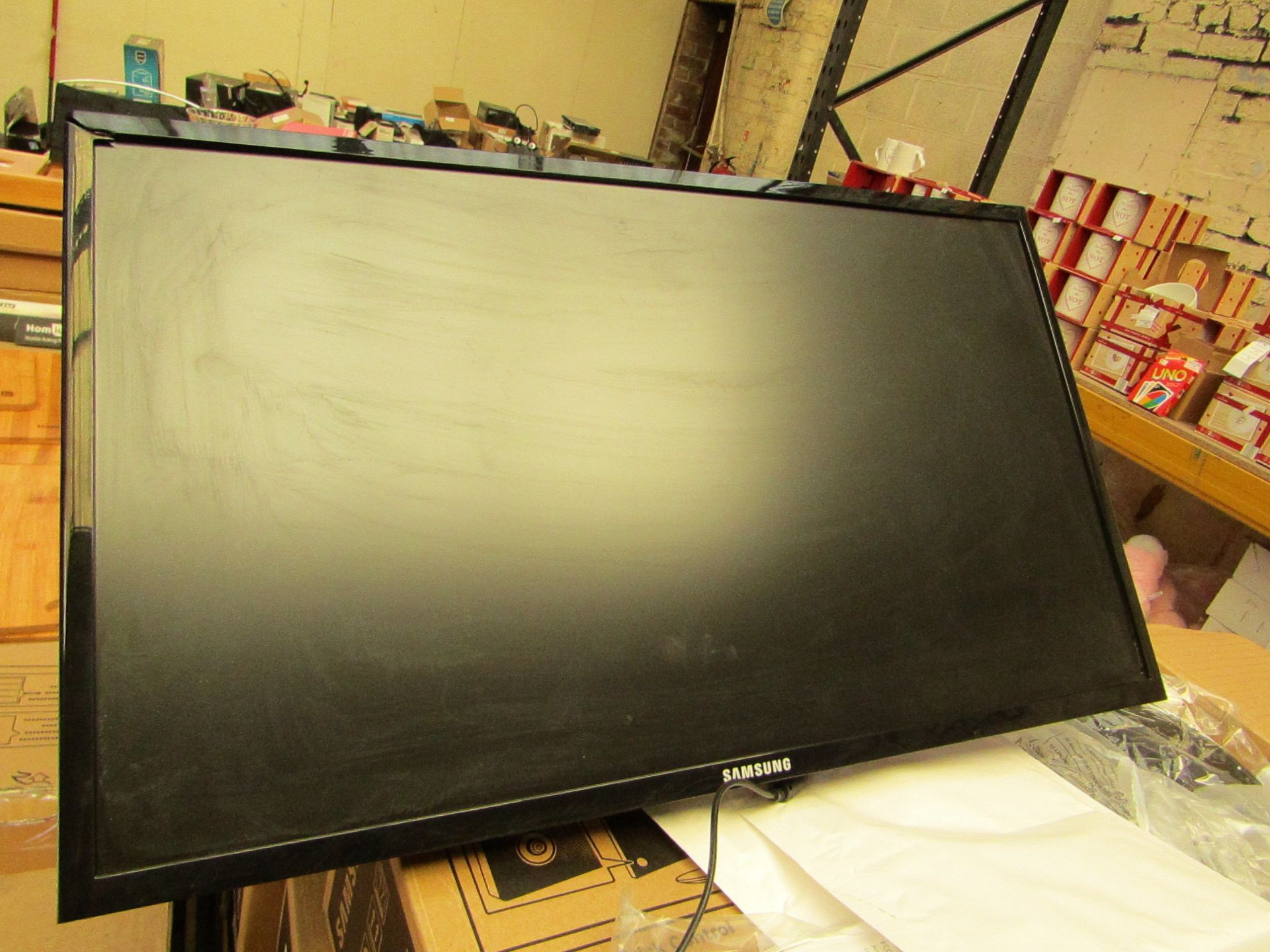 Samsung S24F350FHU 24" LED monitor, tested working and only has cosmetic damage to the frame which