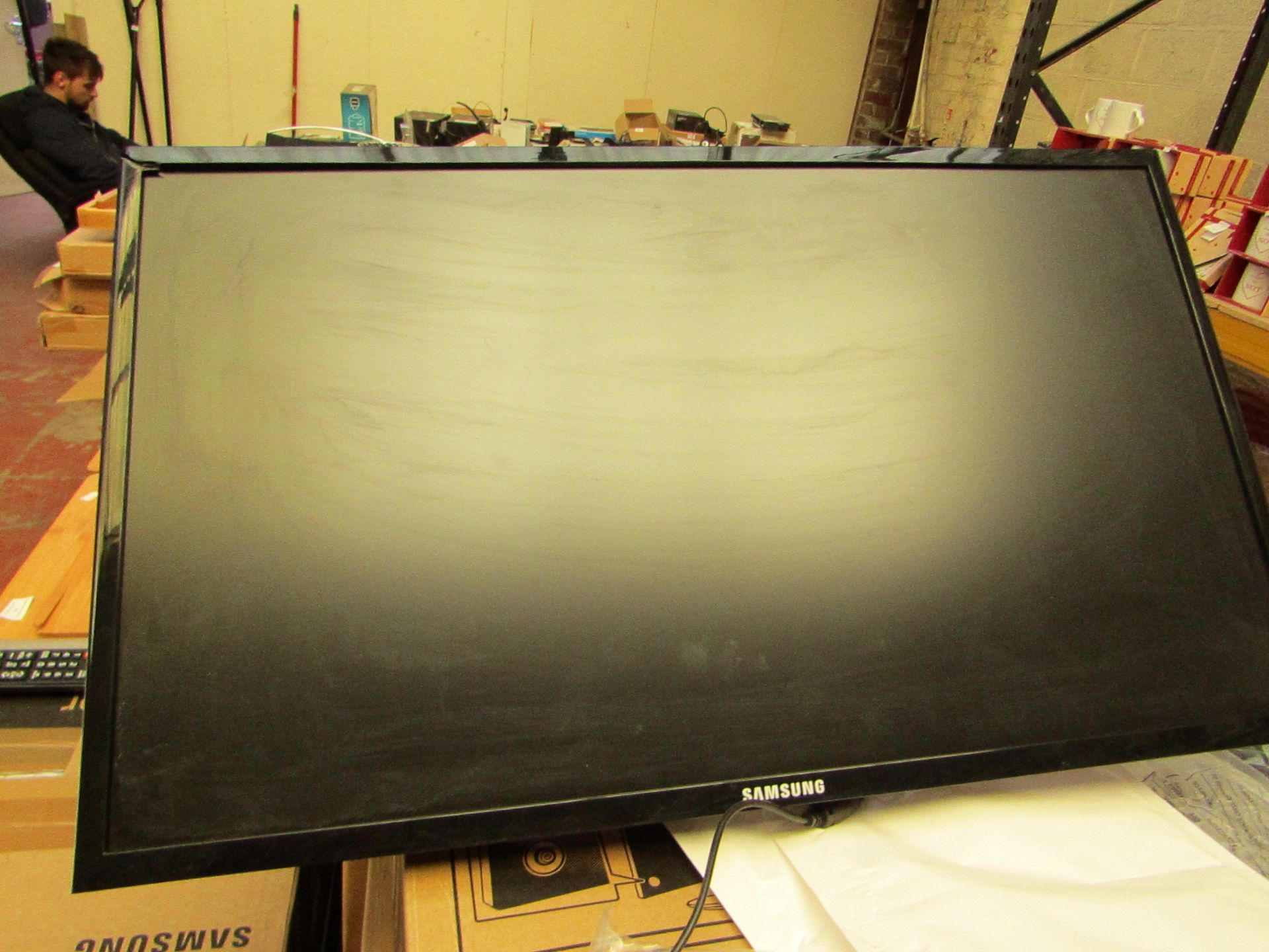 Samsung S24F350FHU 24" LED monitor, tested working and only has cosmetic damage to the frame which