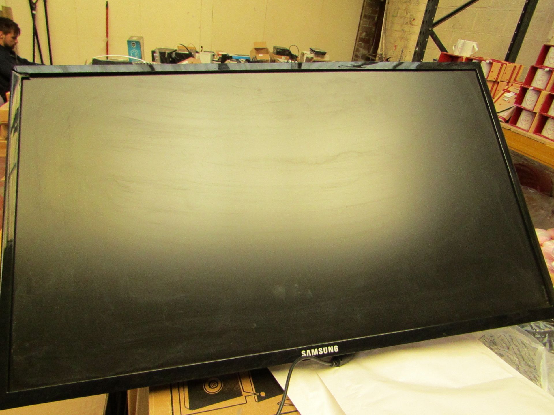 Samsung S24F350FHU 24" LED monitor, tested working and only has cosmetic damage to the frame which