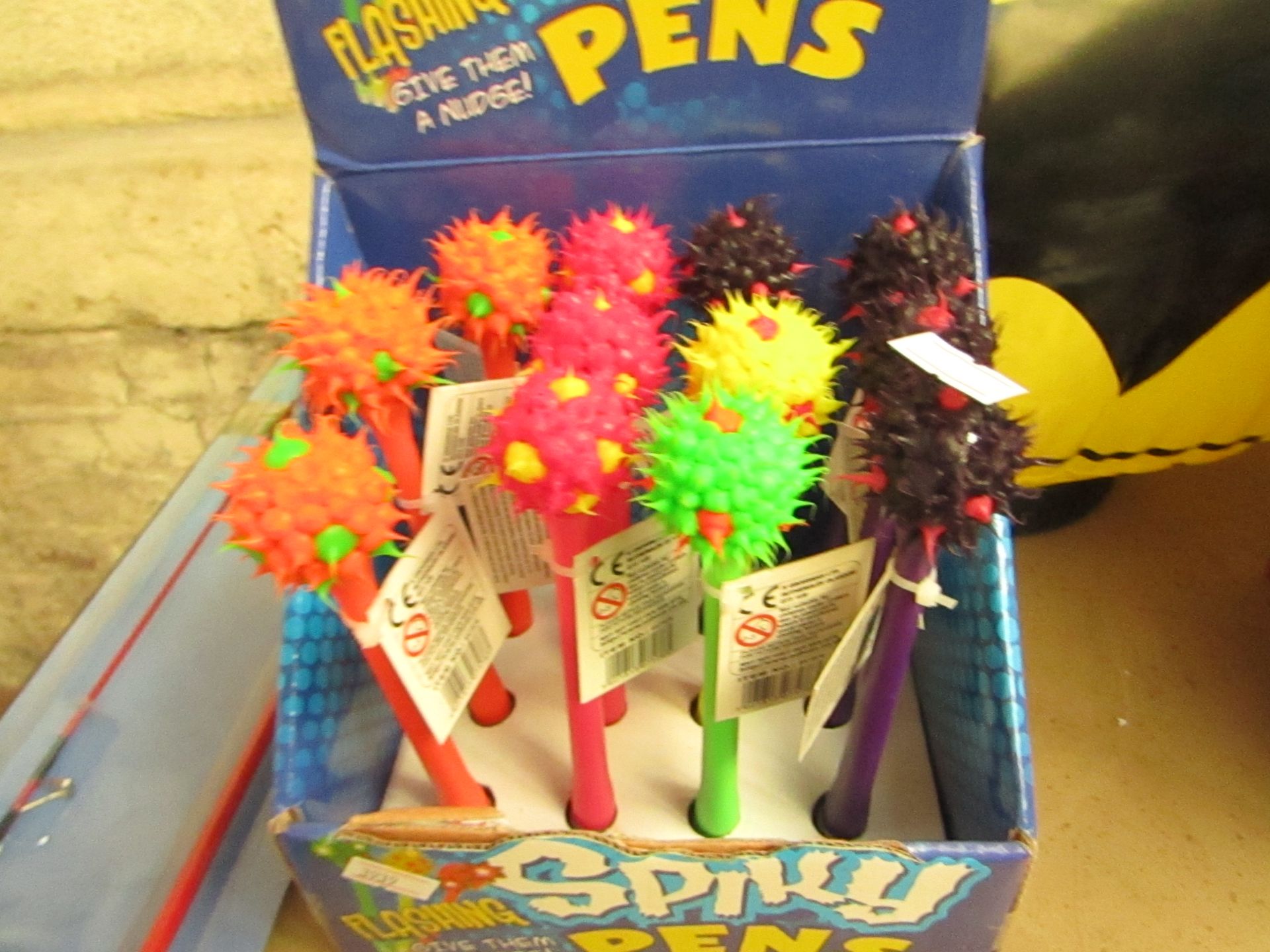 Box of 12 Flashing Spikey Pens.