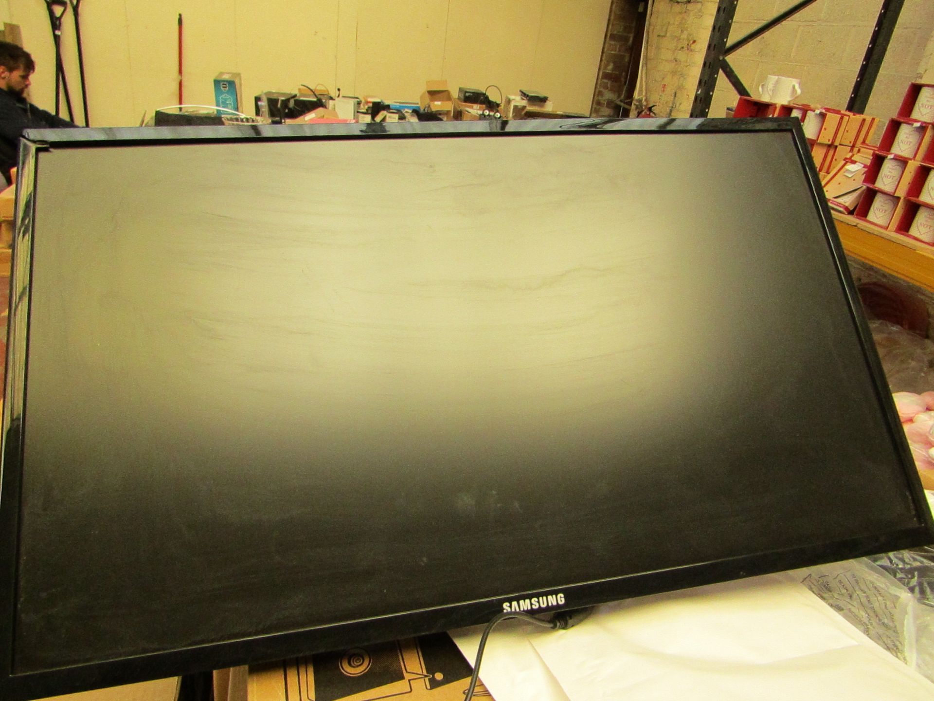 Samsung S24F350FHU 24" LED monitor, tested working and only has cosmetic damage to the frame which