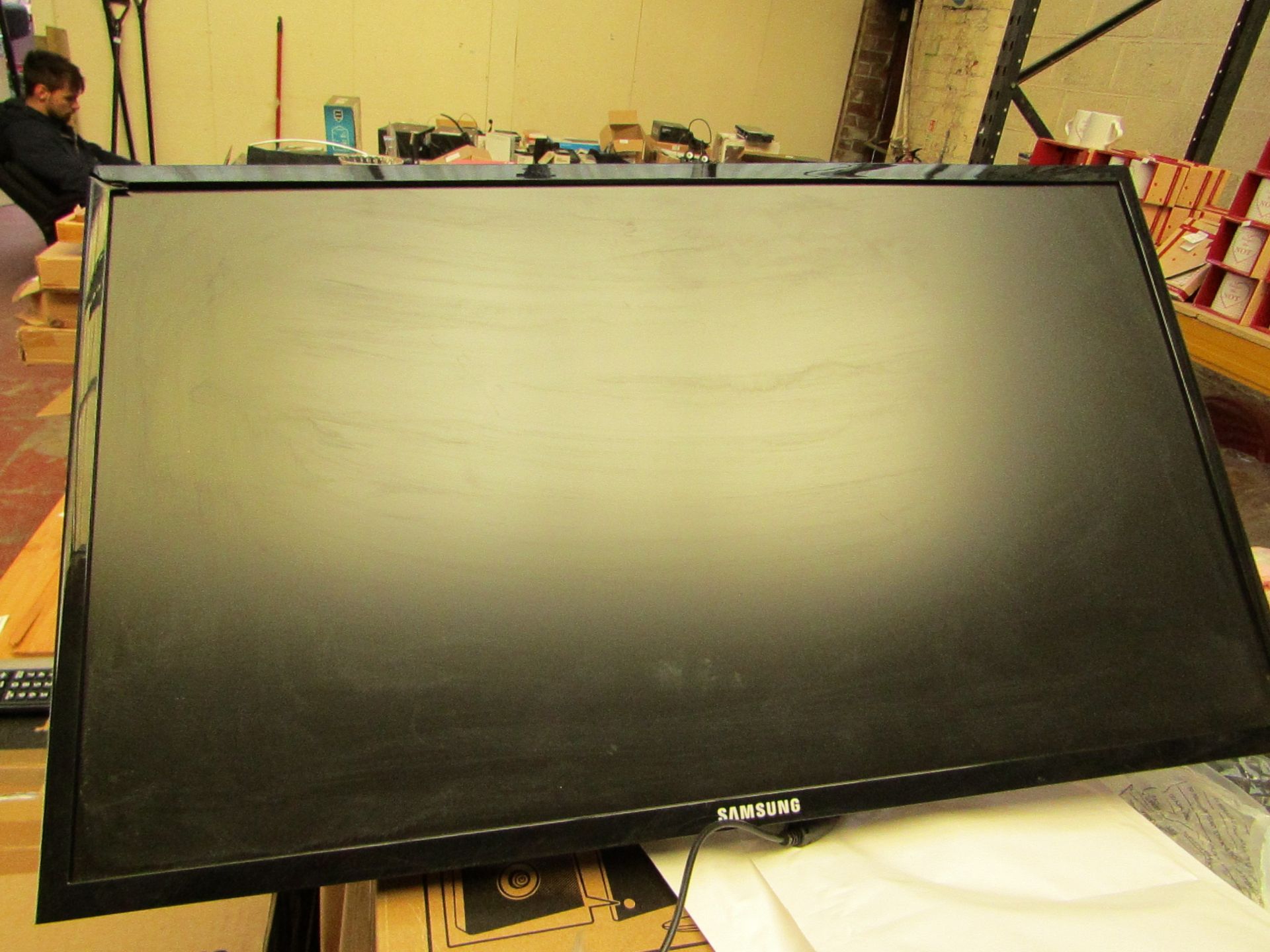 Samsung S24F350FHU 24" LED monitor, tested working and only has cosmetic damage to the frame which