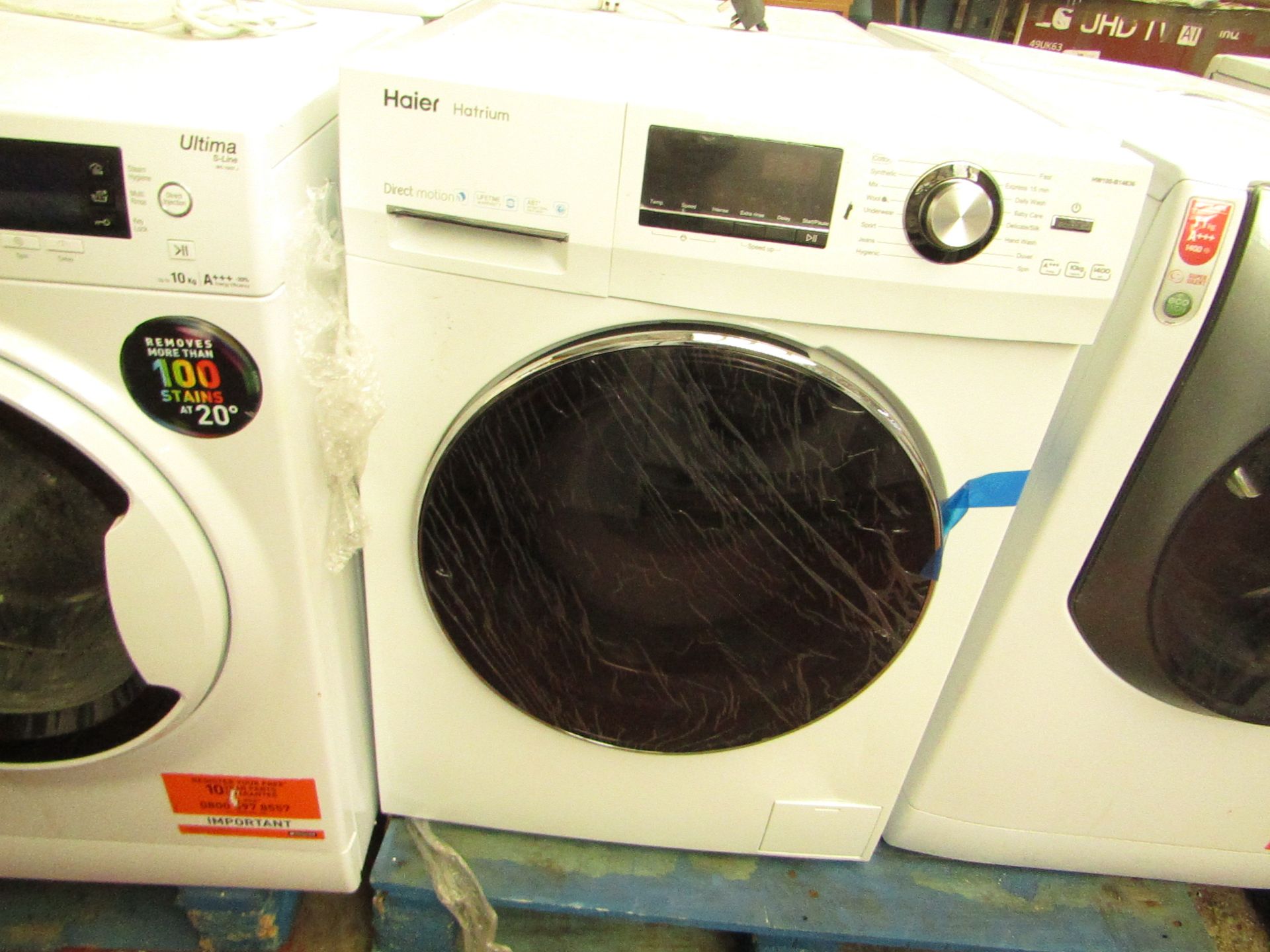 Haier Hatrium 10kg 1400rpm Washing Machine.Powers on and no spin.Top & Front Panel are loose but