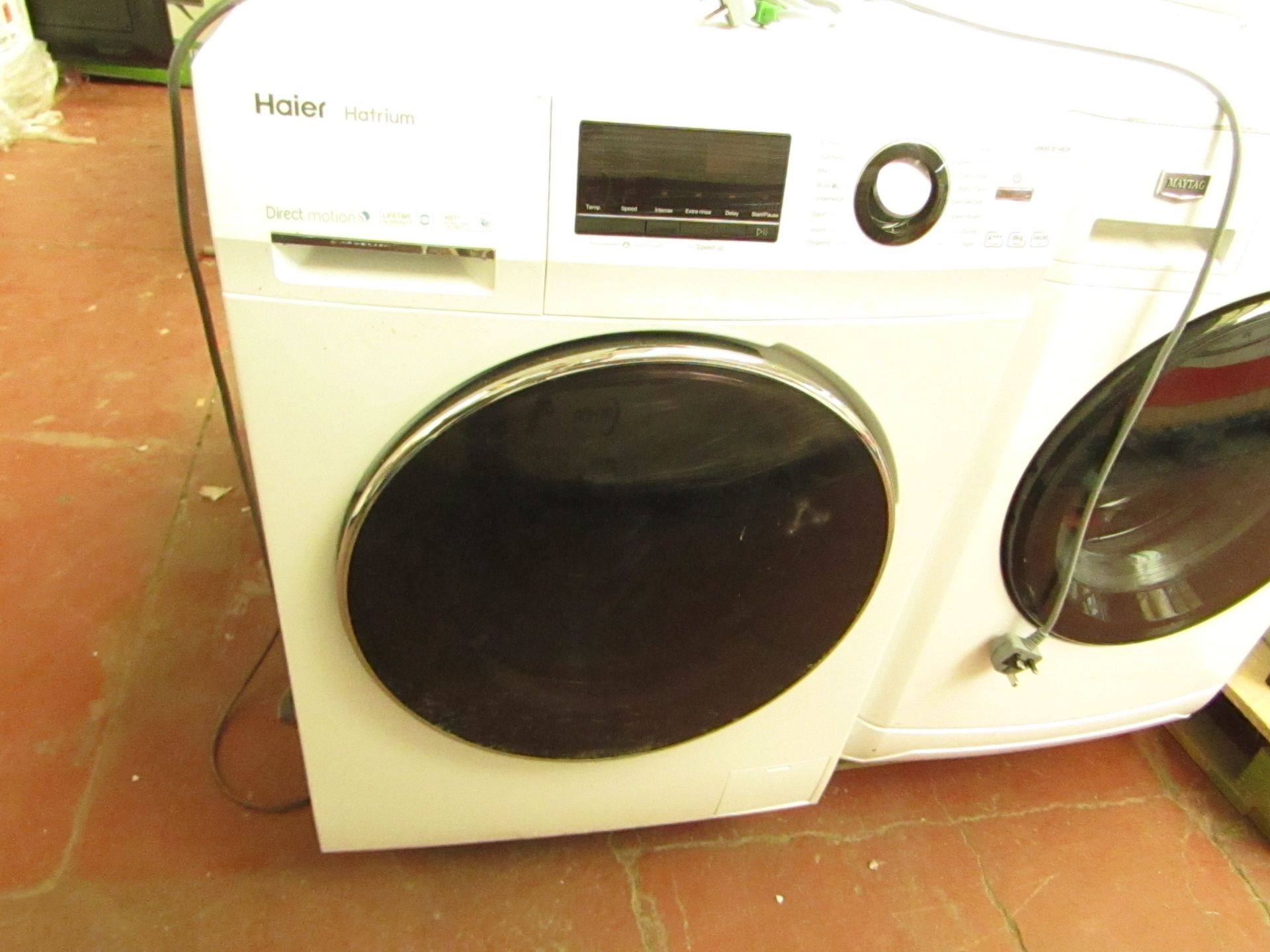 Haier Hatrium 8Kg washing machine, unable to test due to damaged front as buttons are damaged