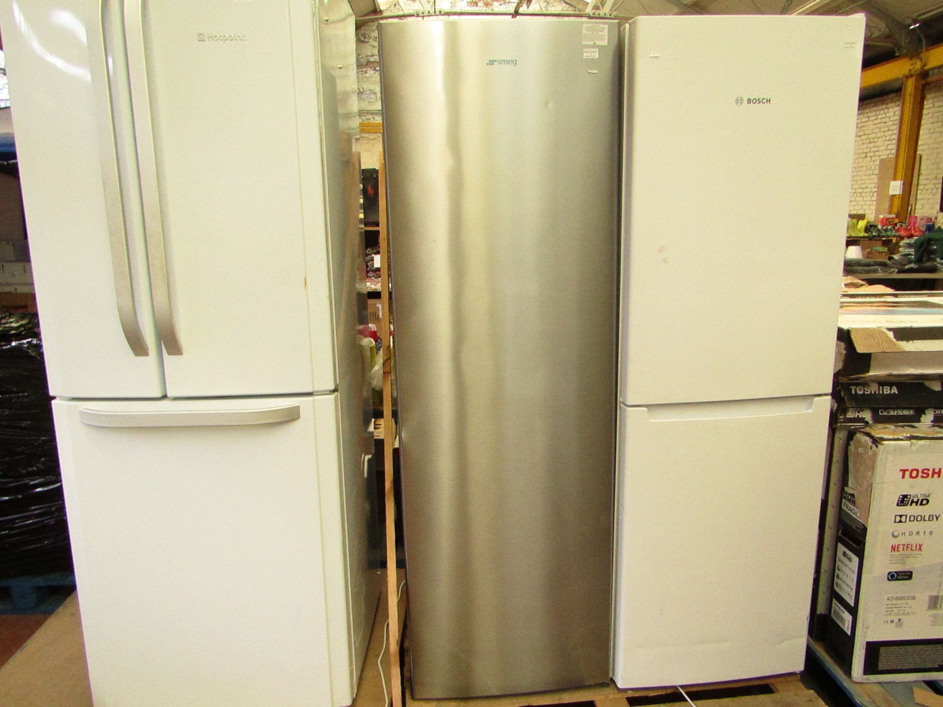 Smeg Tall Standing Fridge.Tested working but needs a new handle